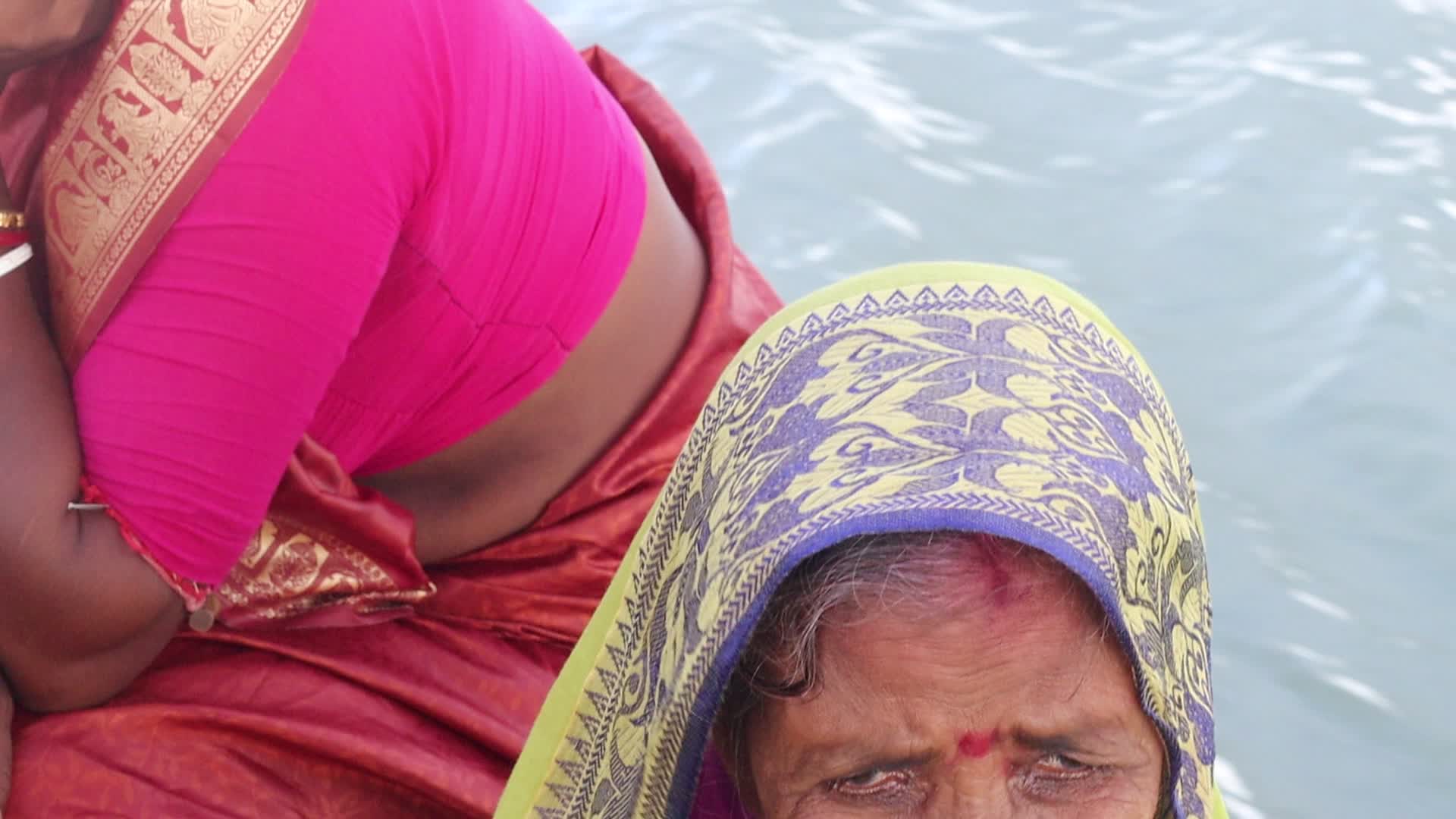 Villagers crossing Chenai river by boat 