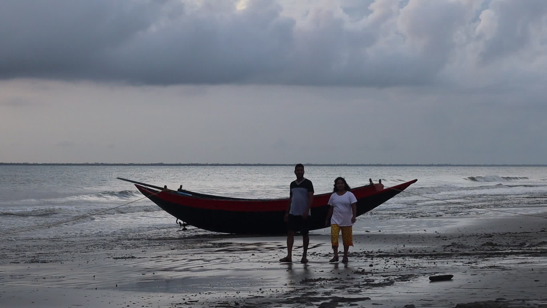 A couple walking at the bank of river at Sunderbans' island