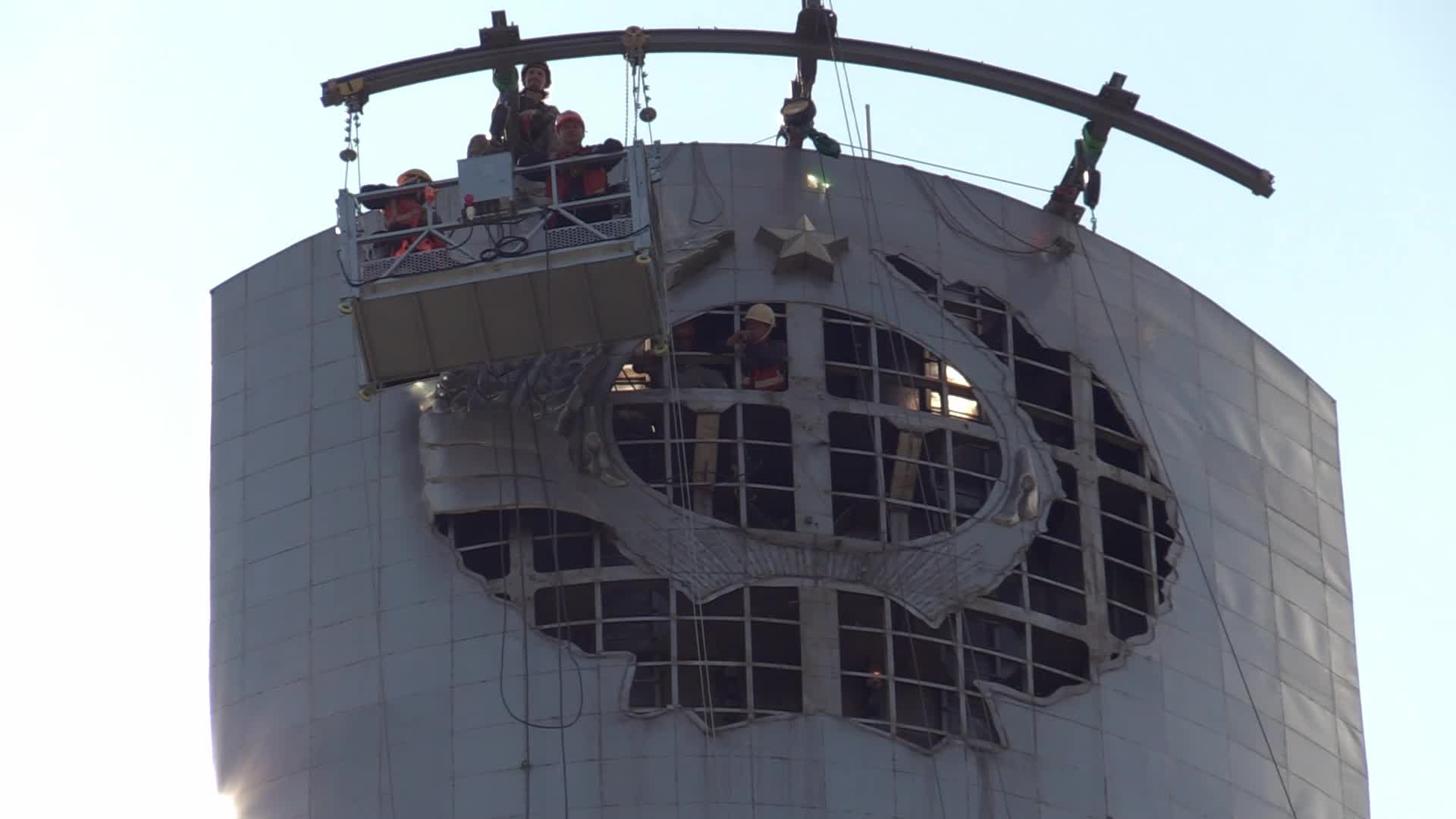 The Soviet coat of arms removed at the Motherland Monument in Kyiv, amid Russian invasion of Ukraine.