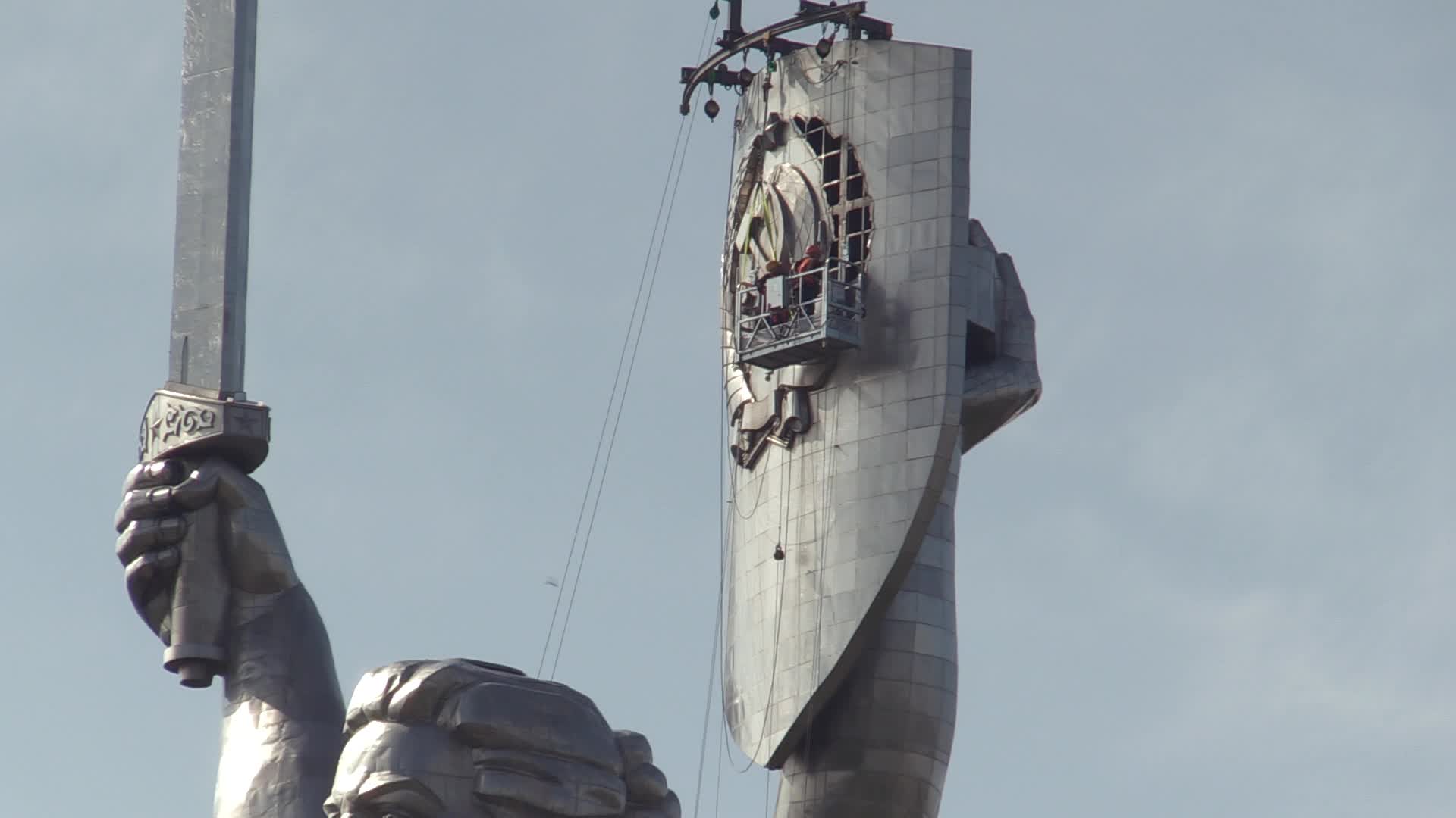The Soviet coat of arms removed at the Motherland Monument in Kyiv, amid Russian invasion of Ukraine.
