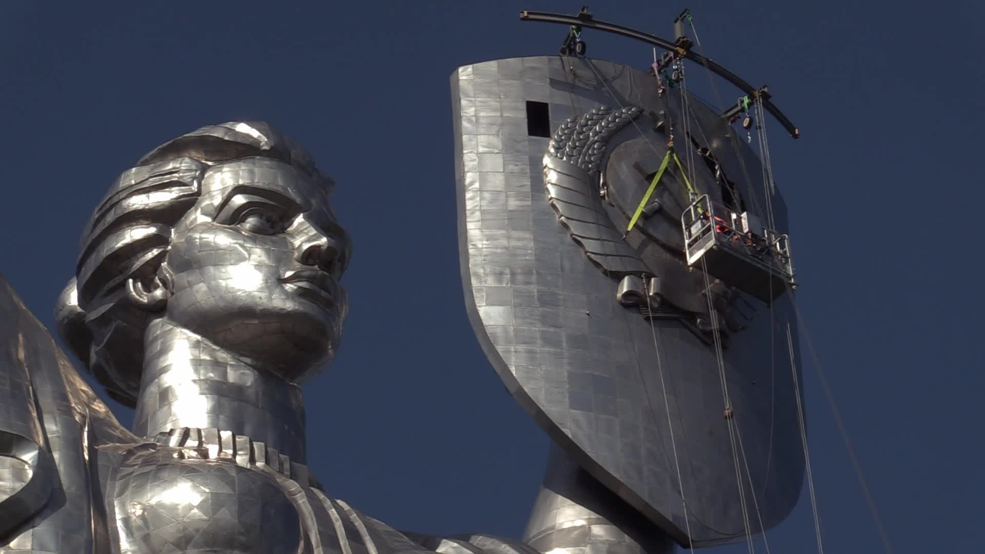 The Soviet coat of arms removed at the Motherland Monument in Kyiv, amid Russian invasion of Ukraine.