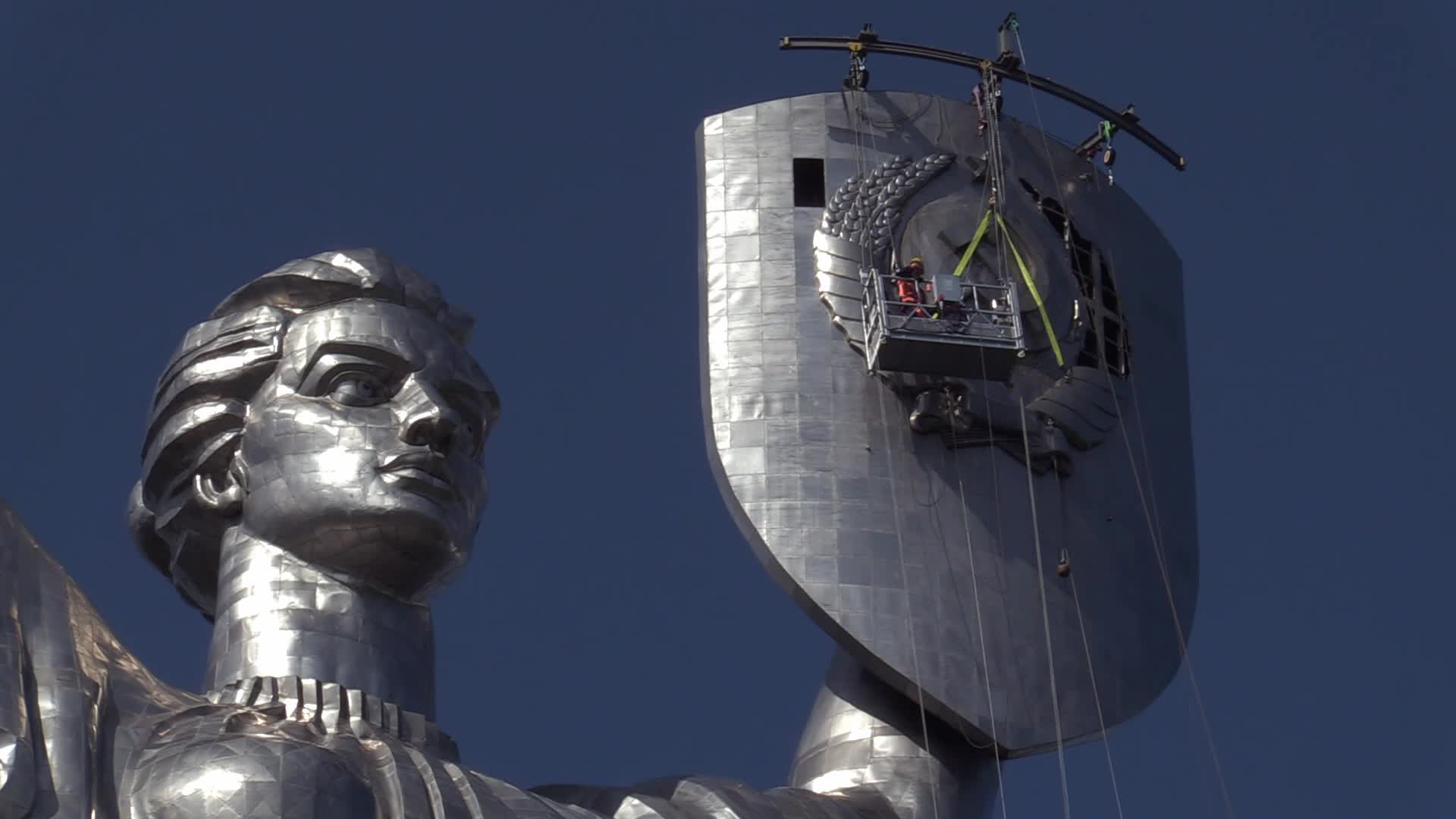 The Soviet coat of arms removed at the Motherland Monument in Kyiv, amid Russian invasion of Ukraine.