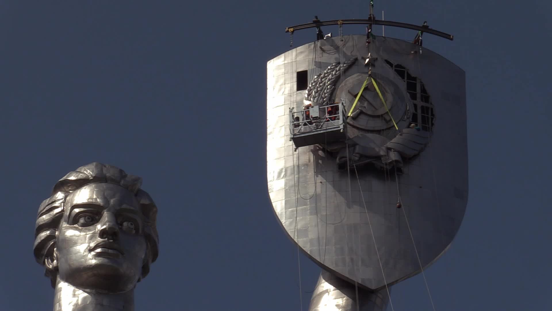 The Soviet coat of arms removed at the Motherland Monument in Kyiv, amid Russian invasion of Ukraine.