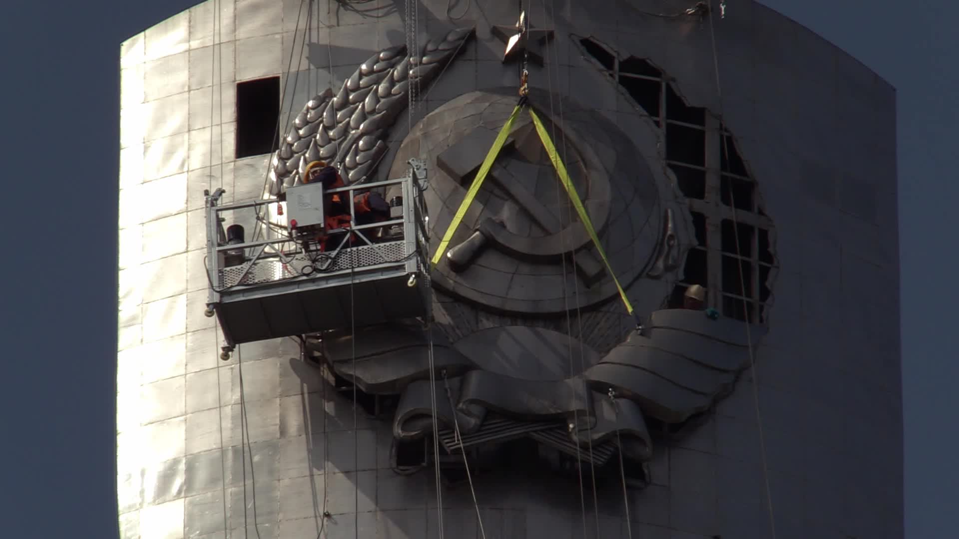 The Soviet coat of arms removed at the Motherland Monument in Kyiv, amid Russian invasion of Ukraine.