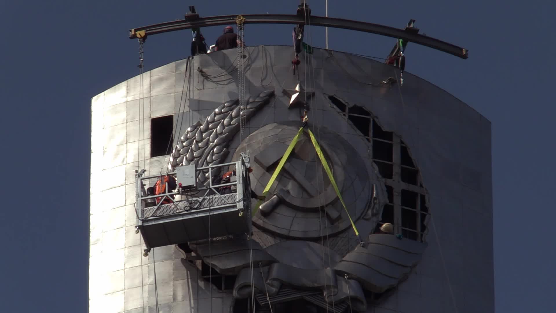 The Soviet coat of arms removed at the Motherland Monument in Kyiv, amid Russian invasion of Ukraine.