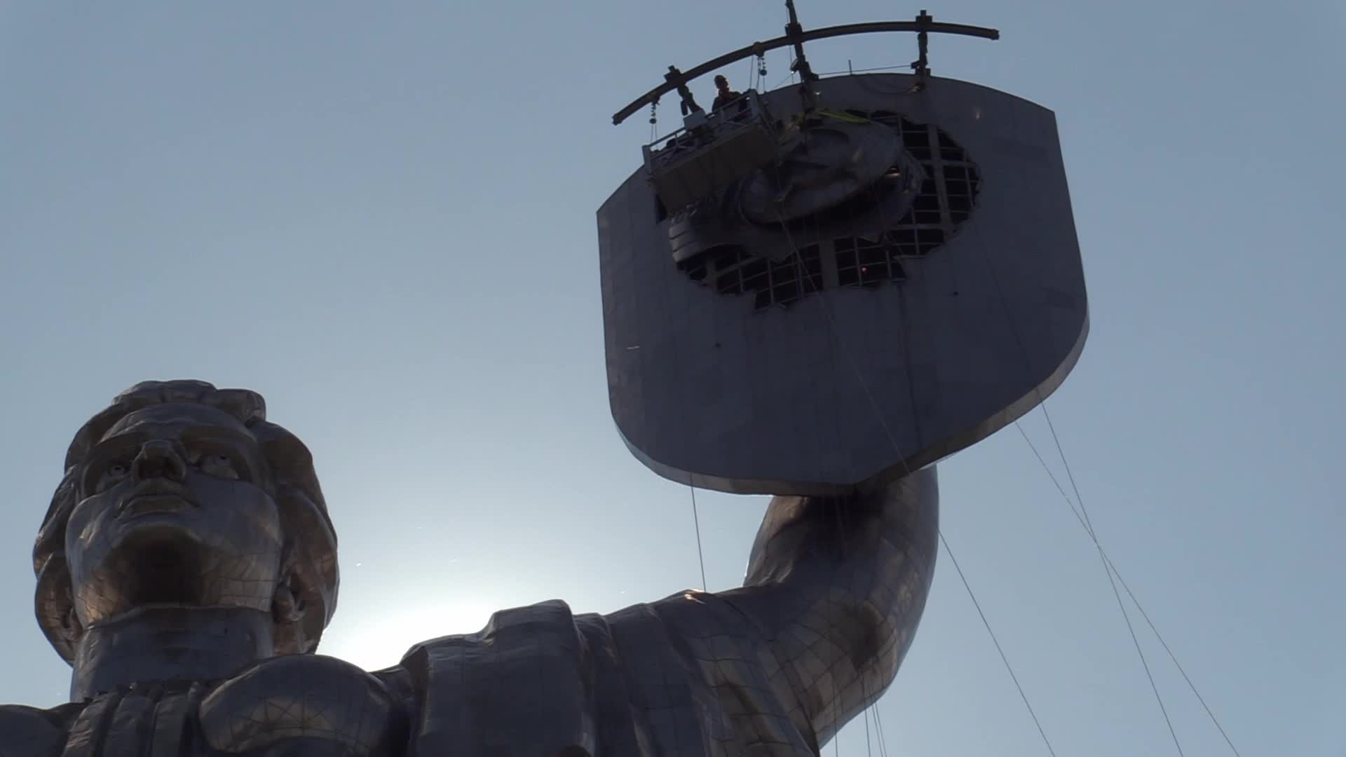 The Soviet coat of arms removed at the Motherland Monument in Kyiv, amid Russian invasion of Ukraine.