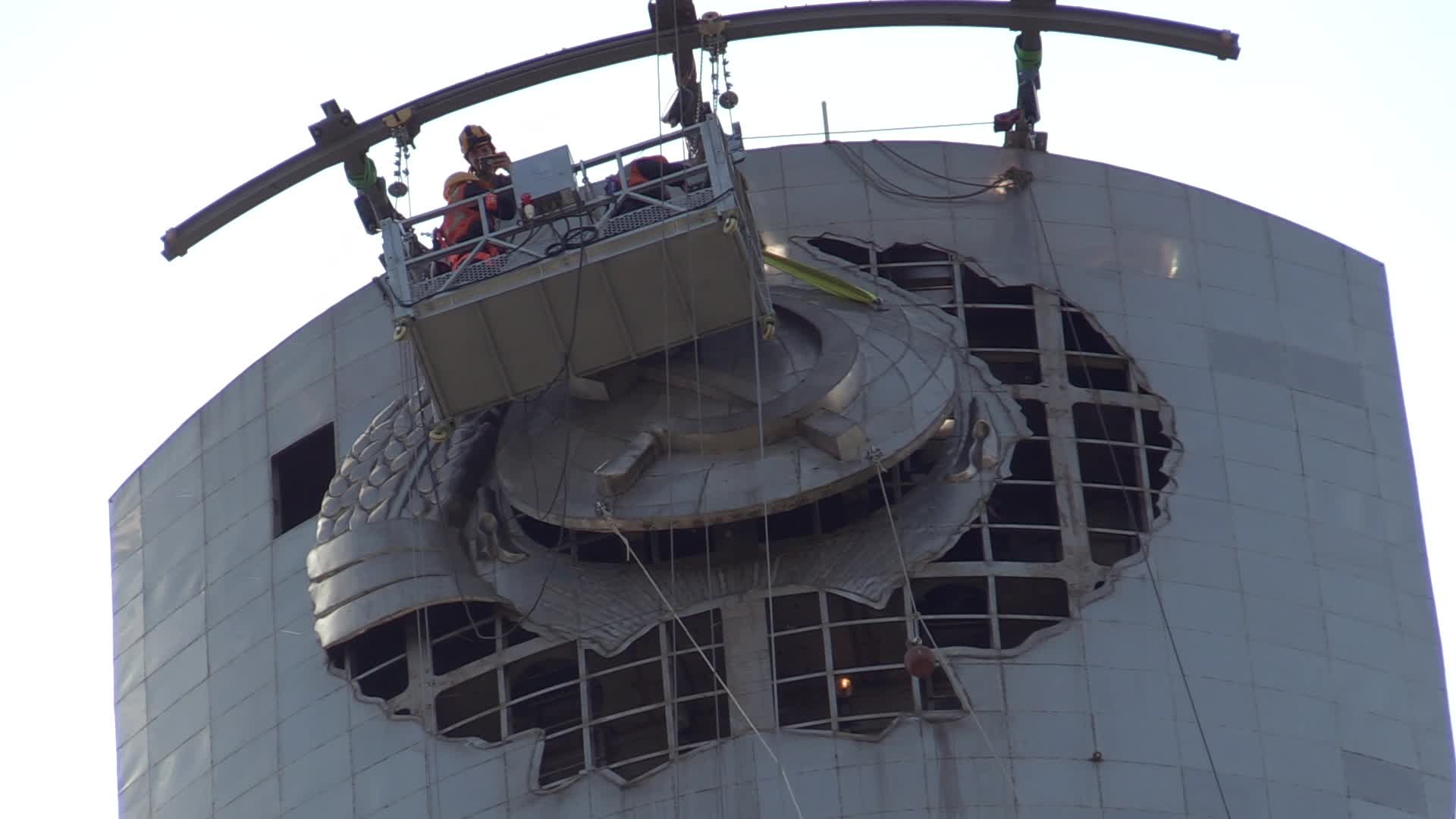 The Soviet coat of arms removed at the Motherland Monument in Kyiv, amid Russian invasion of Ukraine.