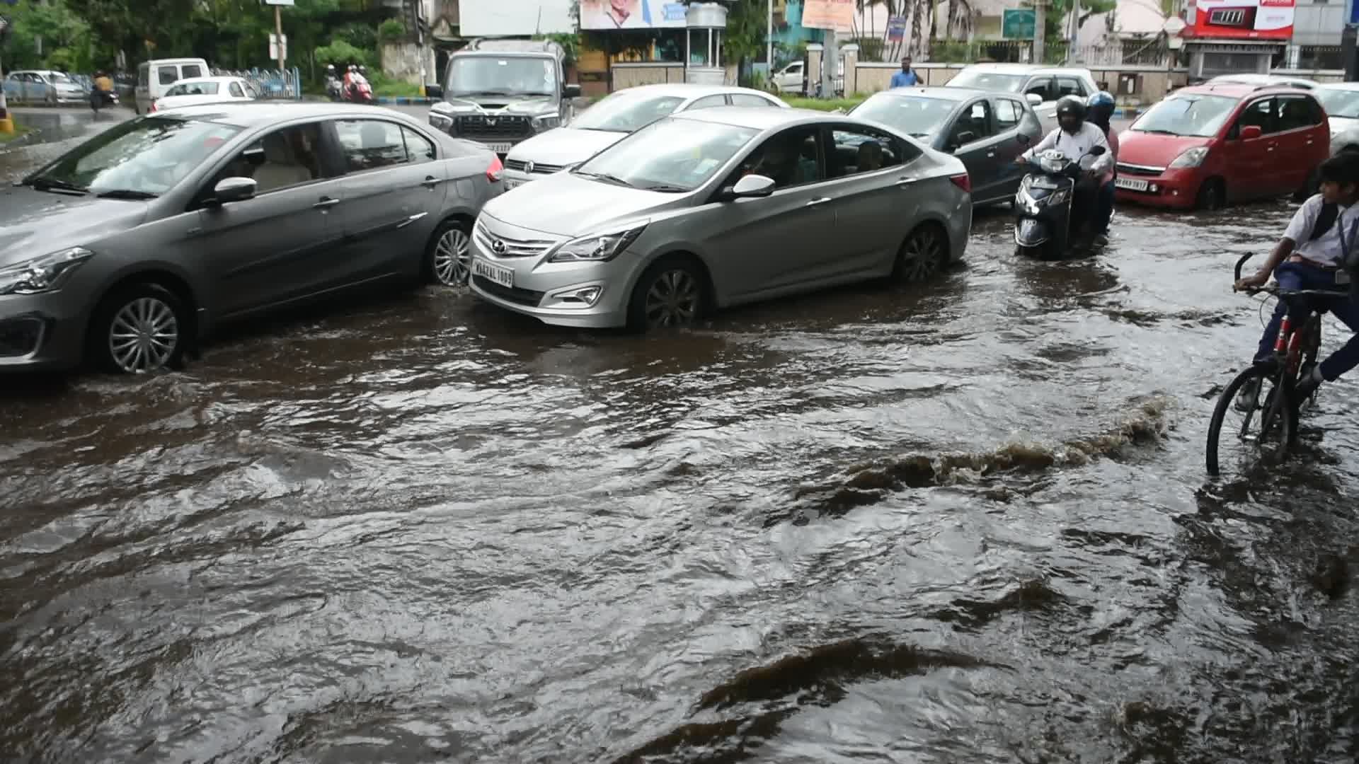 Heavy rain causes flooding in Kolkata.