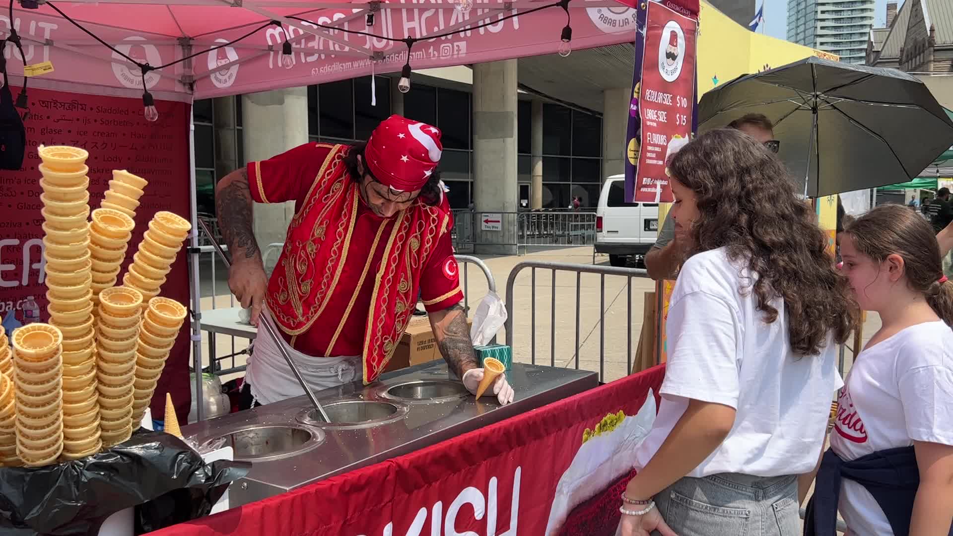 Turkish ice cream vendor performs tricks