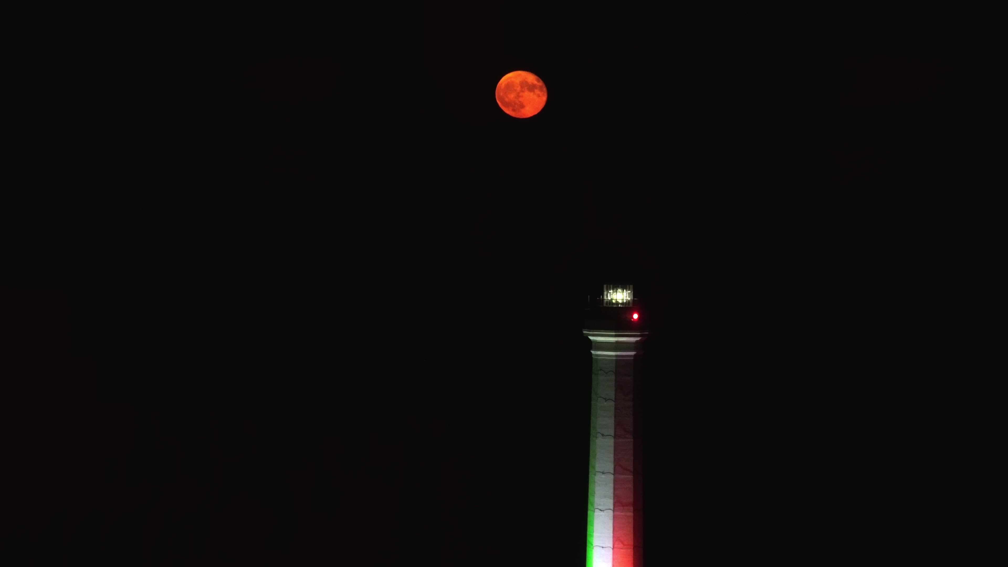 Supermoon Rises Over The Lighthouse of Santa Maria di Leuca