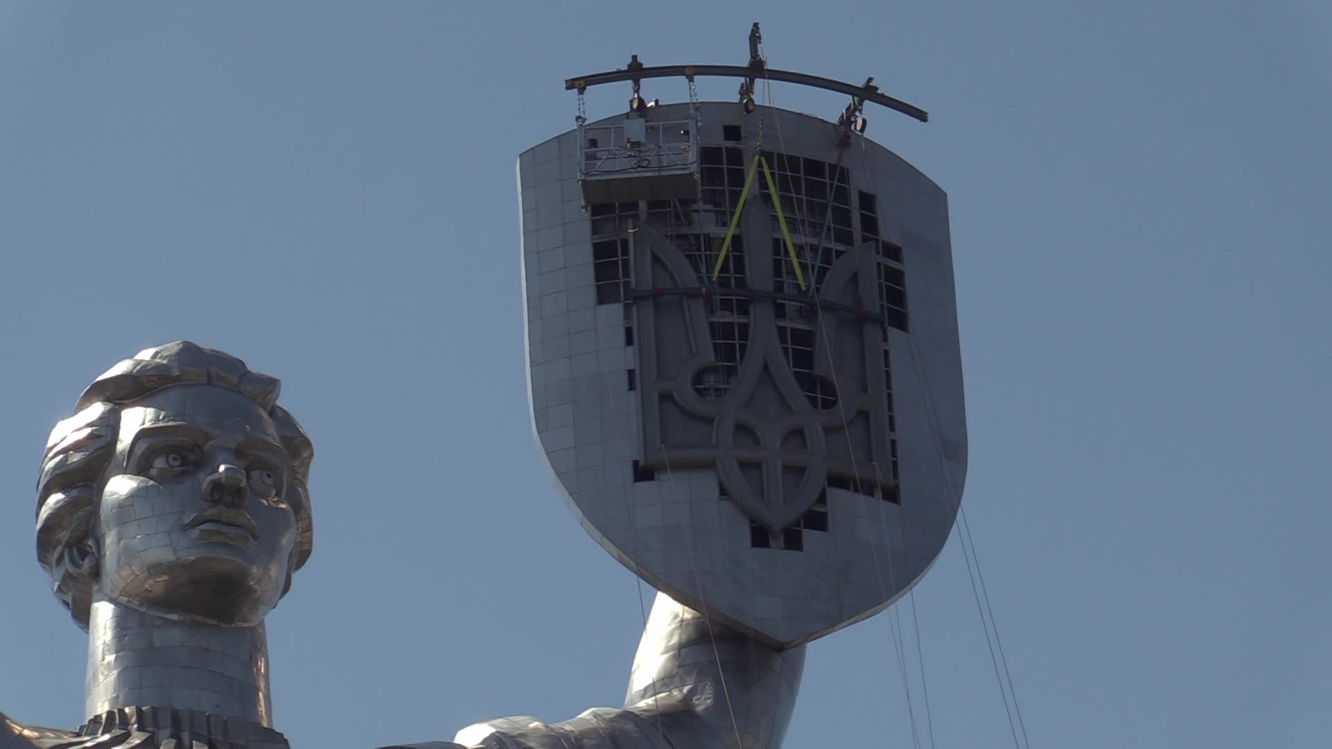 Ukrainian trident replace of the former Soviet emblem on the Motherland Monument in Kyiv, amid Russian invasion of Ukraine.