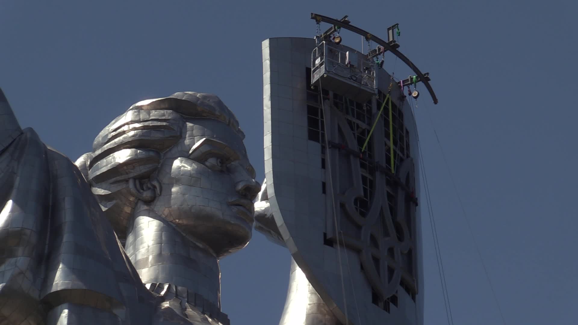 Ukrainian trident replace of the former Soviet emblem on the Motherland Monument in Kyiv, amid Russian invasion of Ukraine.