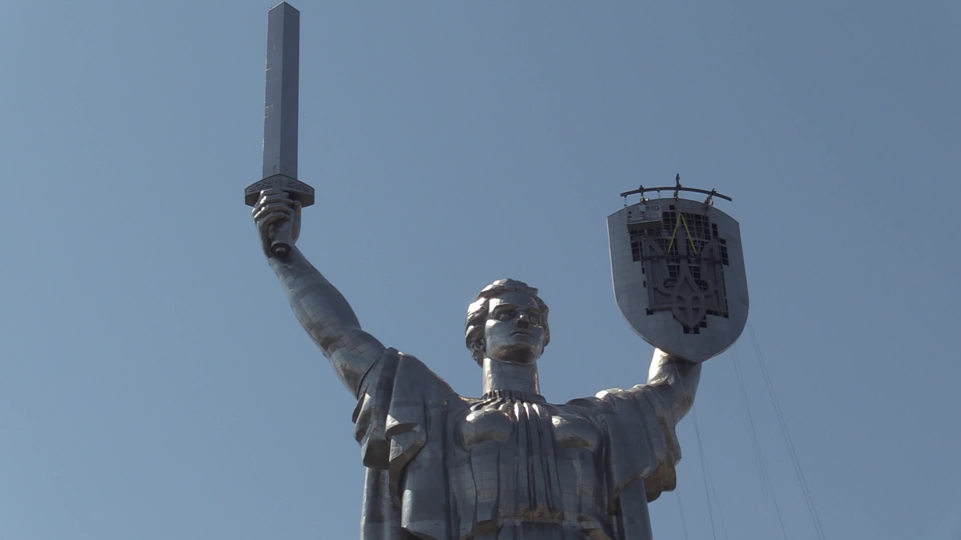Ukrainian trident replace of the former Soviet emblem on the Motherland Monument in Kyiv, amid Russian invasion of Ukraine.