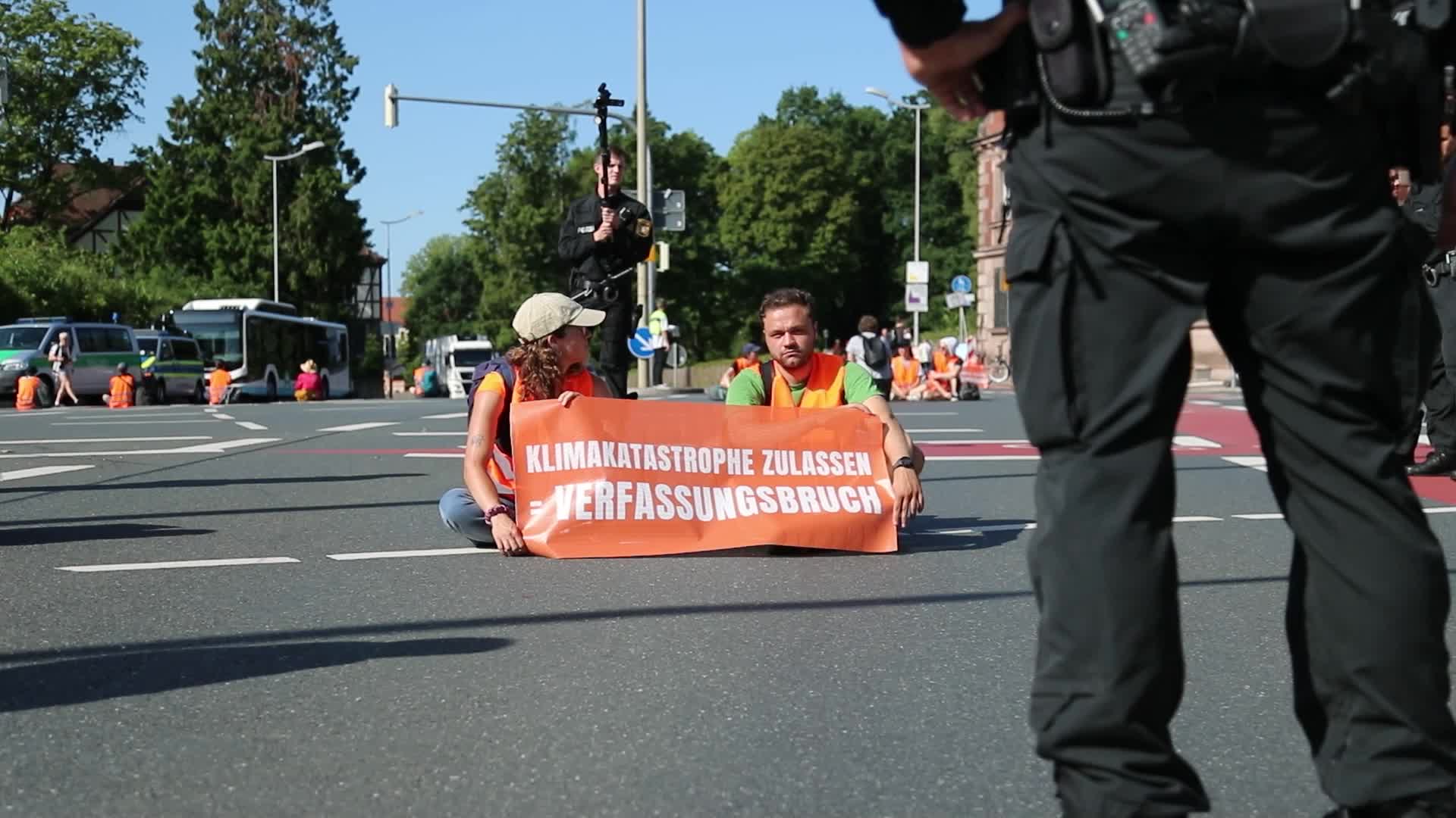 Letzte Generation blocks roads in front of the Faber-Castell Castle in Nuremberg