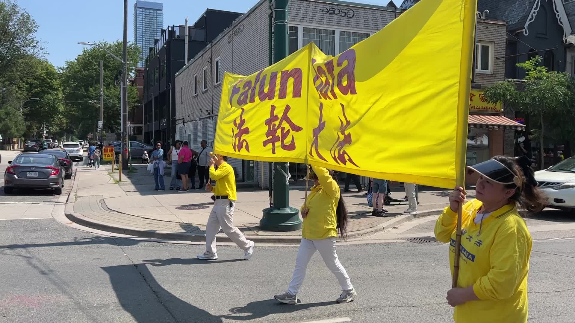 Members of the Falun Gong protest against the Communist Party of China