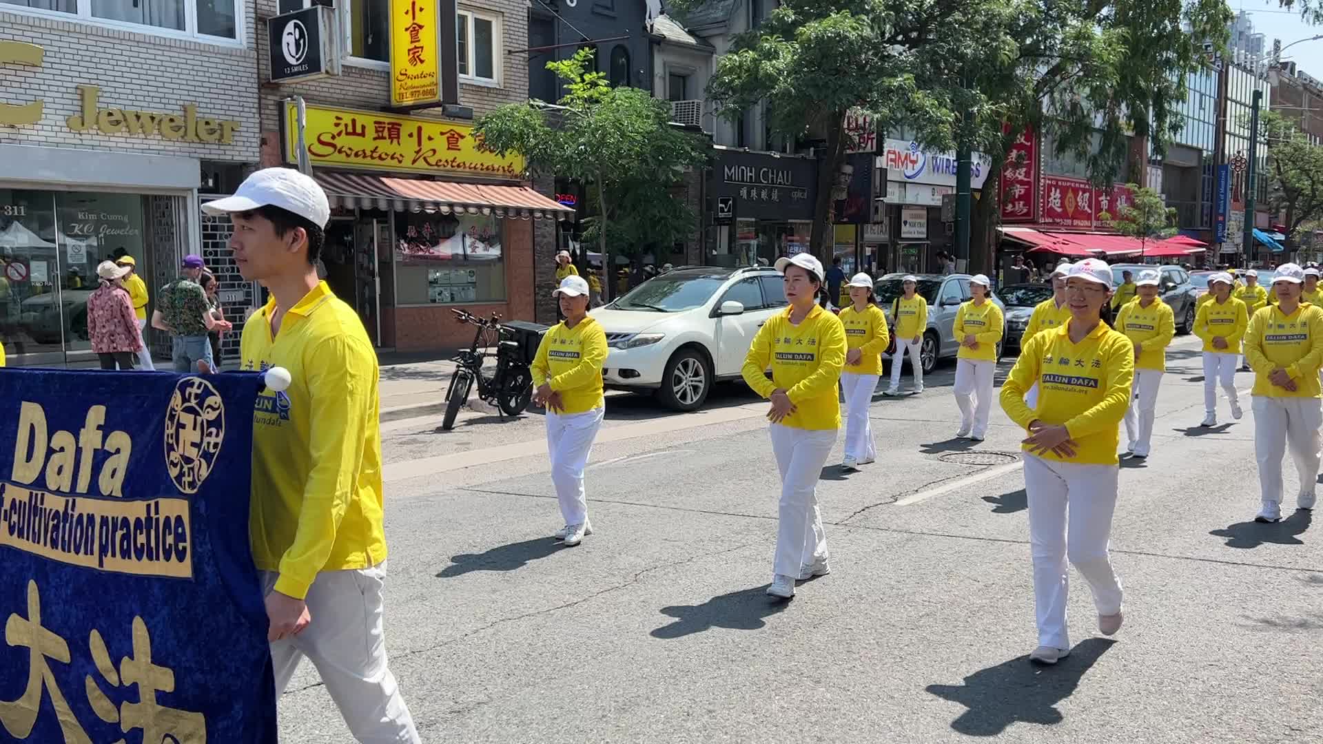 Members of the Falun Gong protest against the Communist Party of China