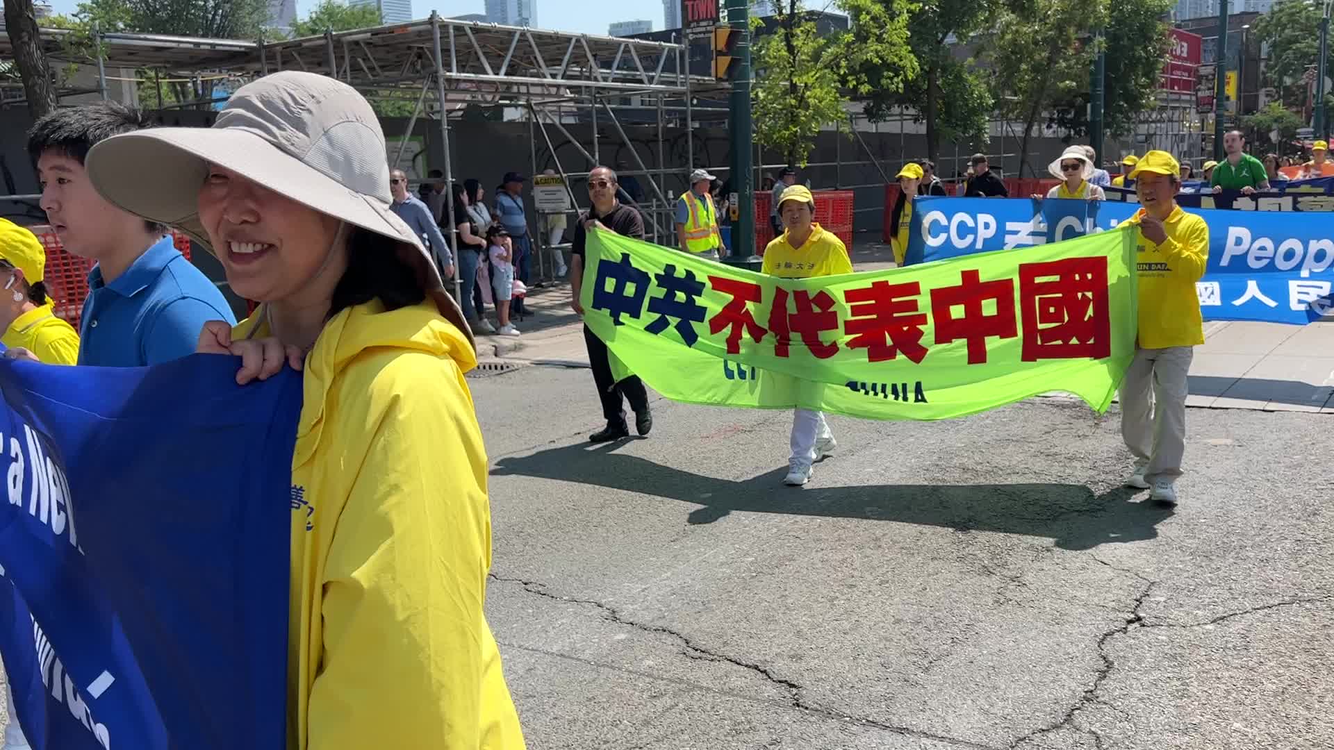 Members of the Falun Gong protest against the Communist Party of China