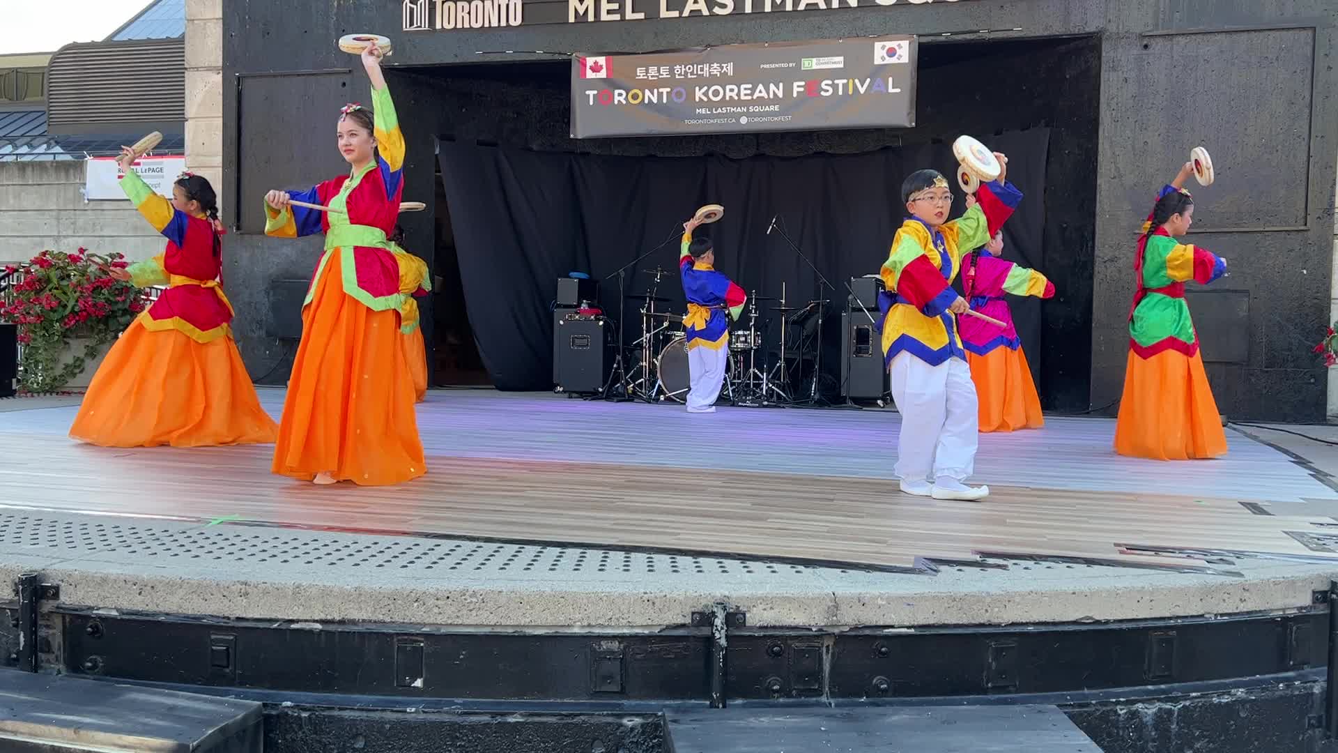 Korean youth perform a traditional Korean drum dance