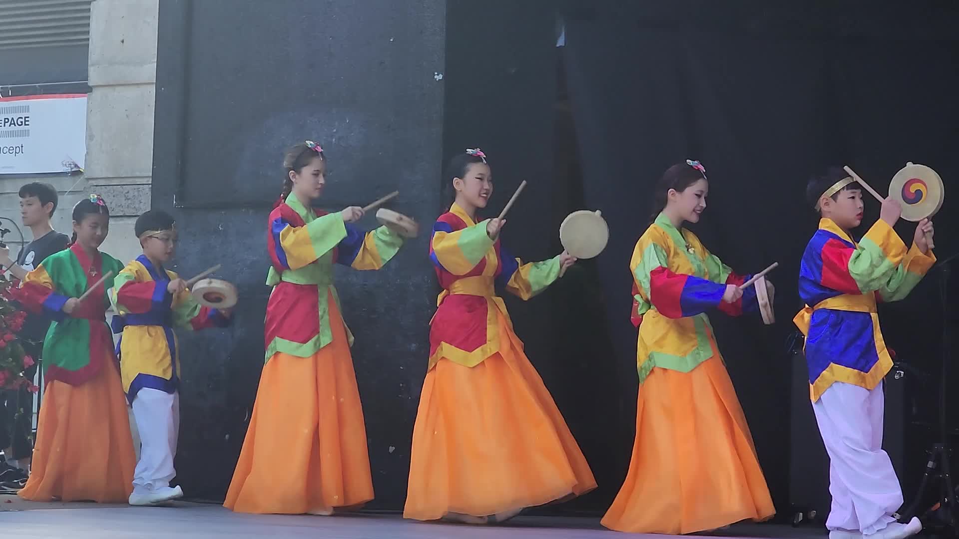 Korean youth perform a traditional Korean drum dance