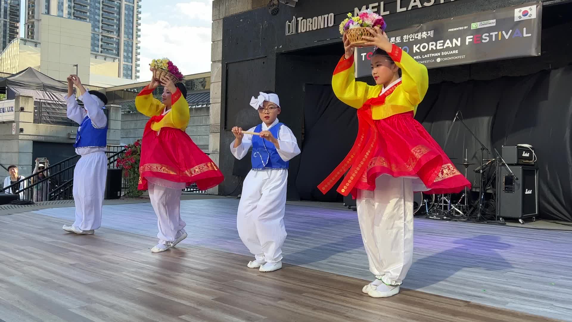 Korean children perform the flower basket dance
