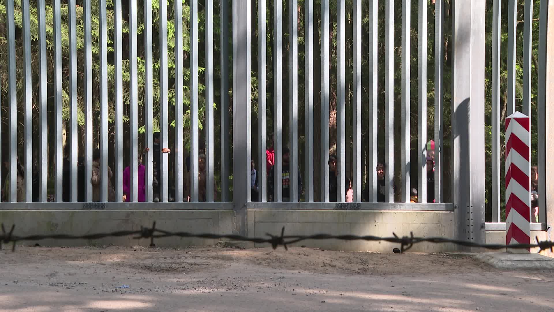 Migrants stuck at Poland's border wall with Belarus