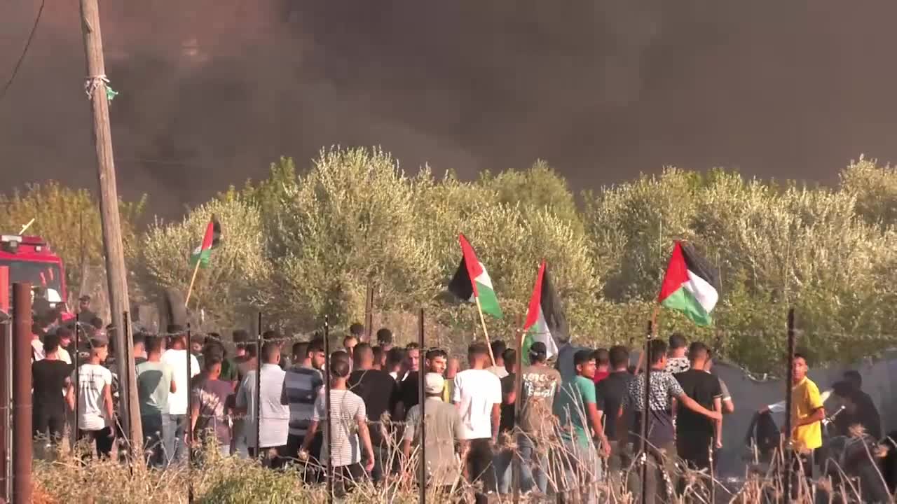 Clashes erupt between Palestinians and Israeli troops at Gaza Strip border 