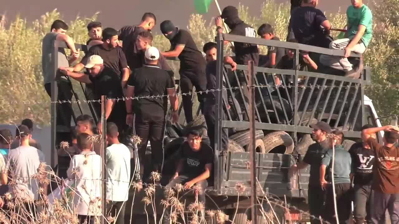 Clashes erupt between Palestinians and Israeli troops at Gaza Strip border 