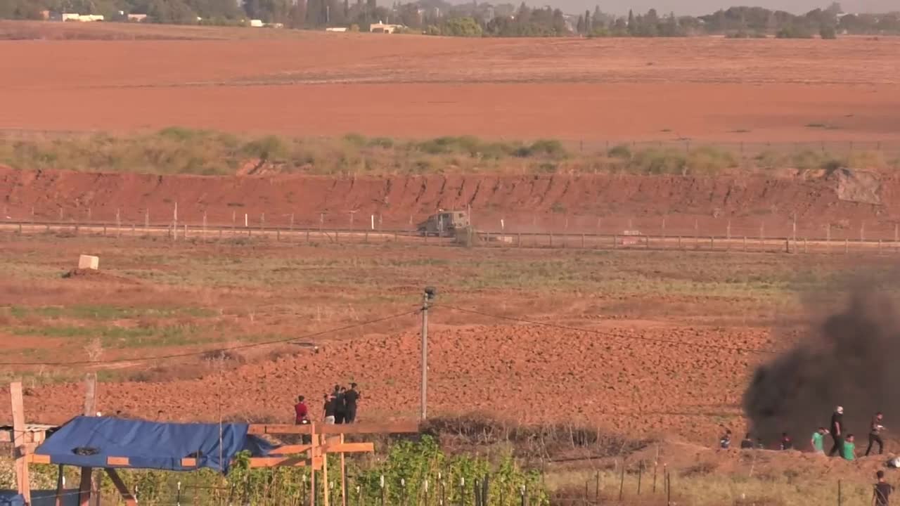 Clashes erupt between Palestinians and Israeli troops at Gaza Strip border 