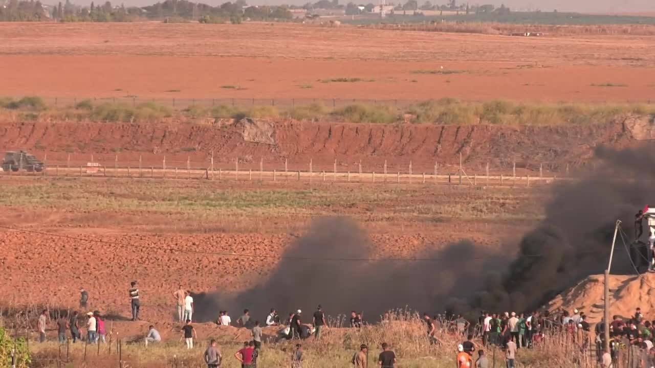 Clashes erupt between Palestinians and Israeli troops at Gaza Strip border 