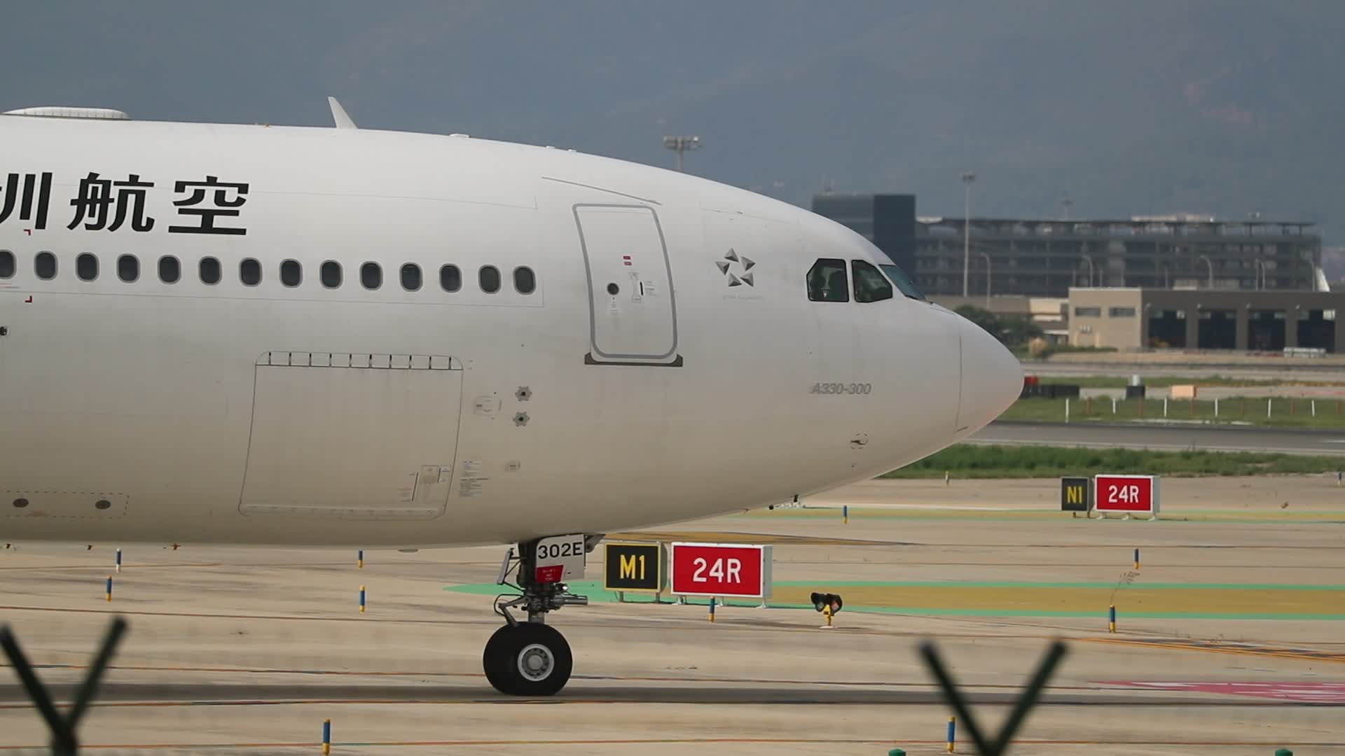 Shenzhen Airlines Airbus 330 taking off from Barcelona airport
