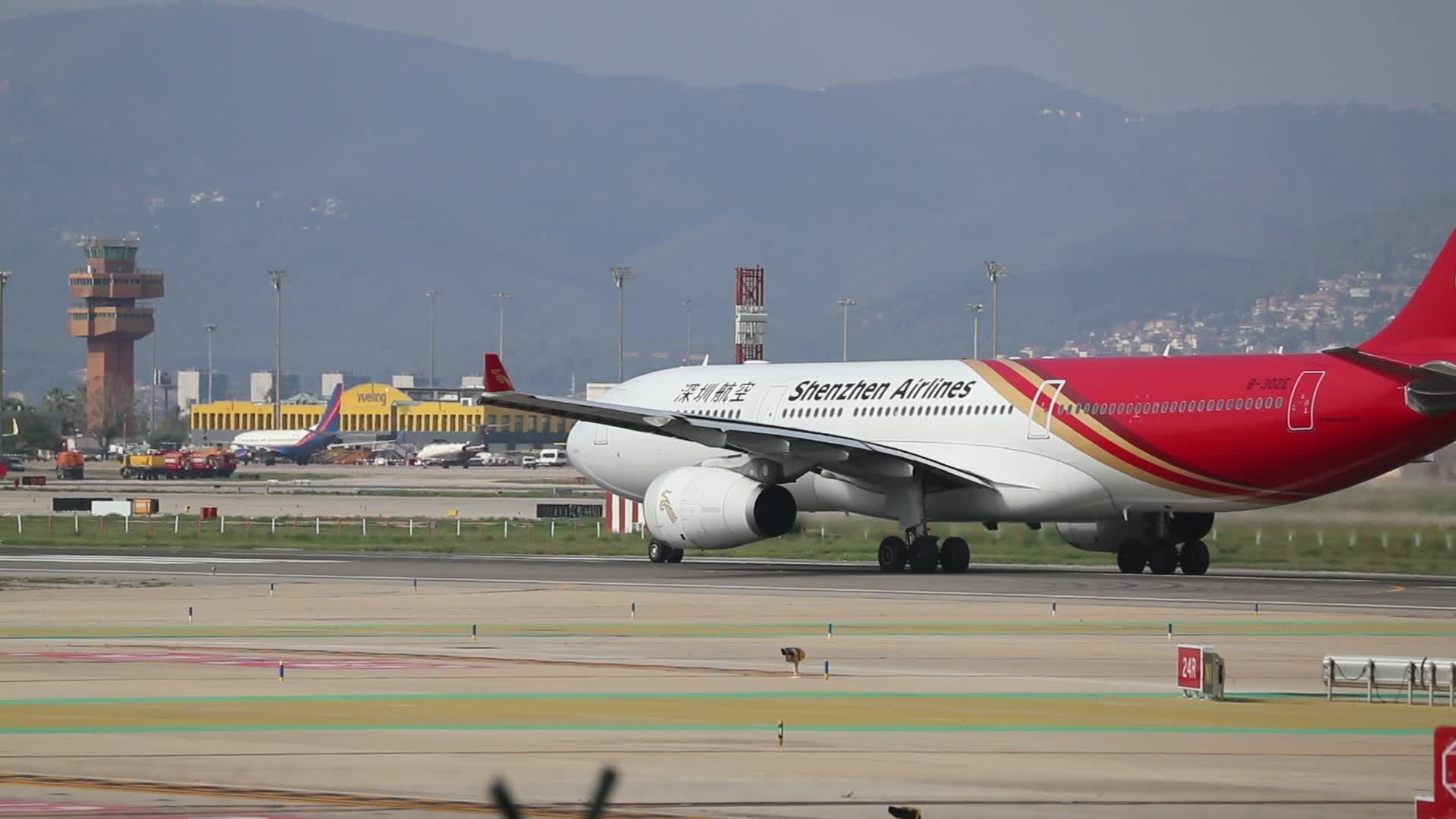 Shenzhen Airlines Airbus 330 taking off from Barcelona airport