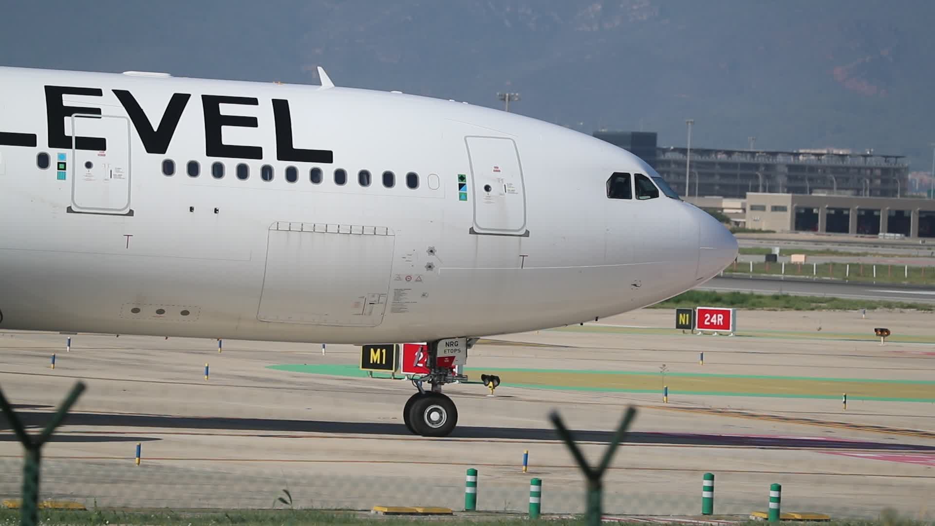 Level Airbus taking off from Barcelona airport