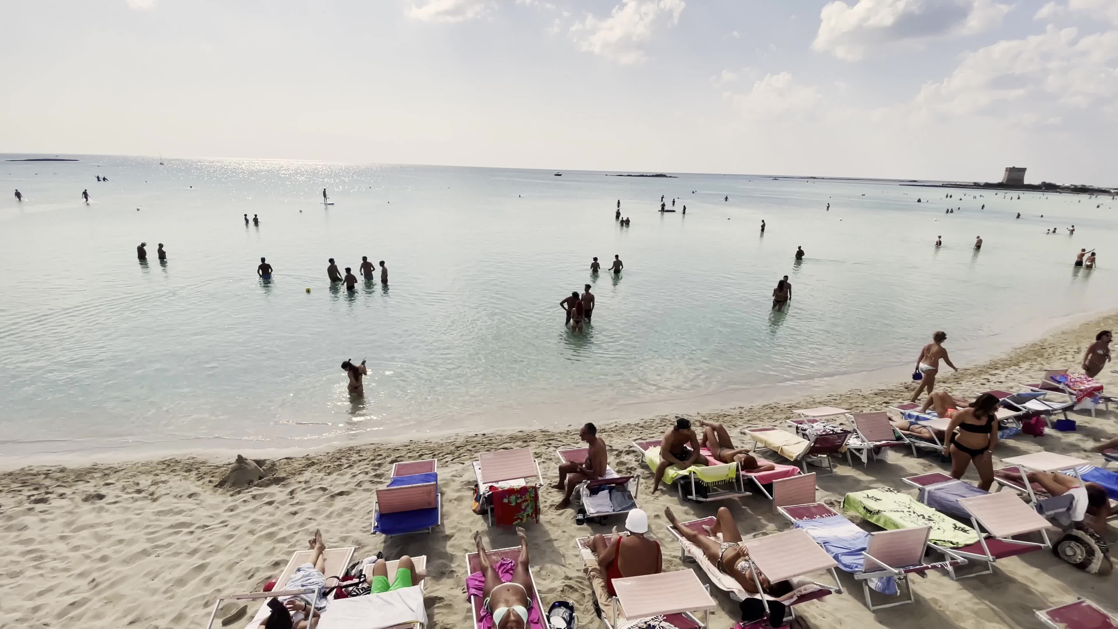 People at Sea in October in Salento, Italy