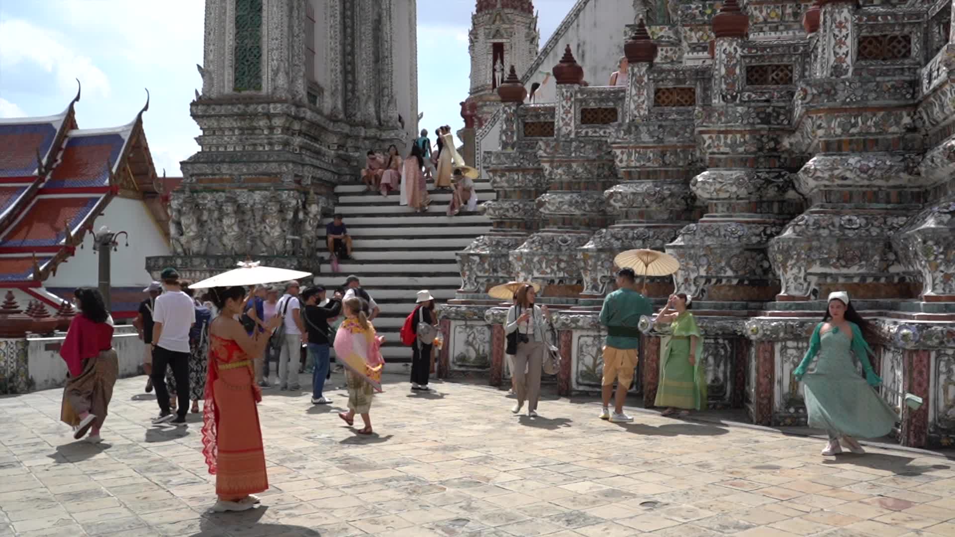Tourists Visit the Temple of Dawn.