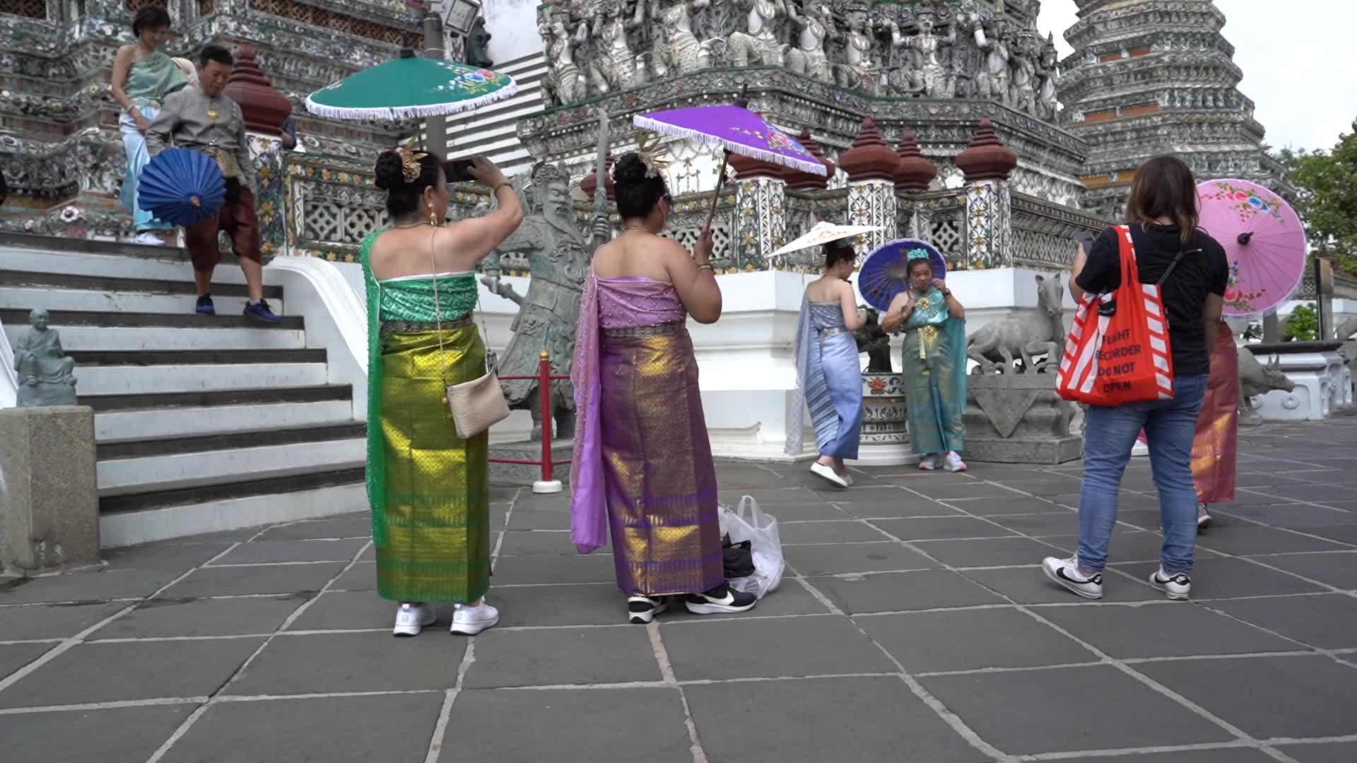Tourists Visit the Temple of Dawn.