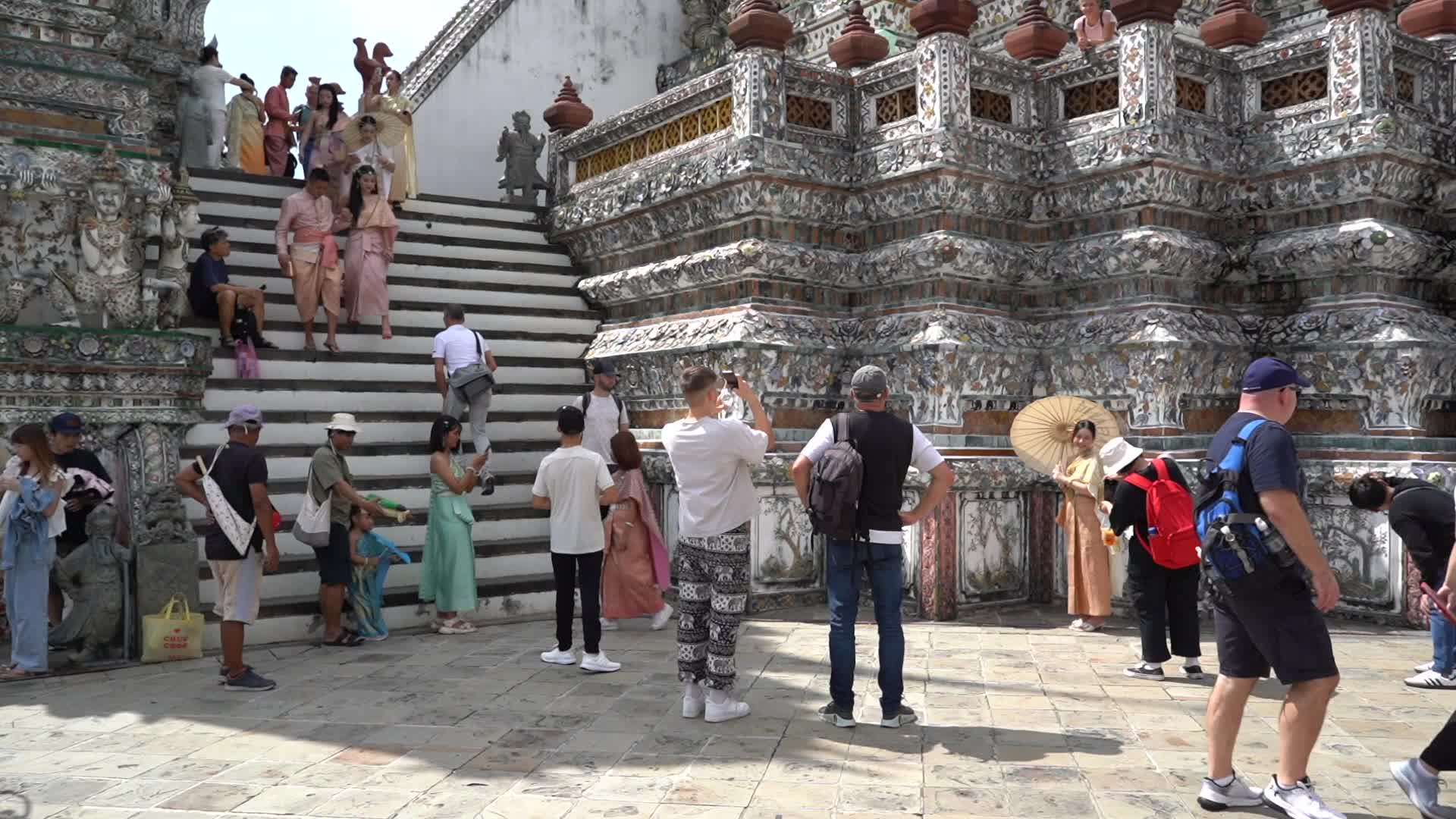 Tourists Visit the Temple of Dawn.