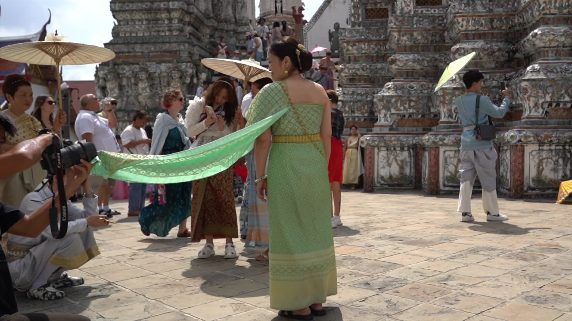 Tourists Visit the Temple of Dawn.