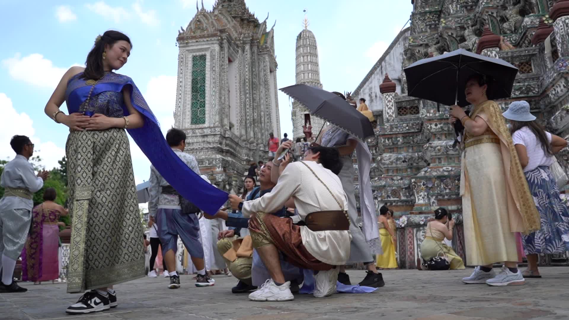 Tourists Visit the Temple of Dawn.