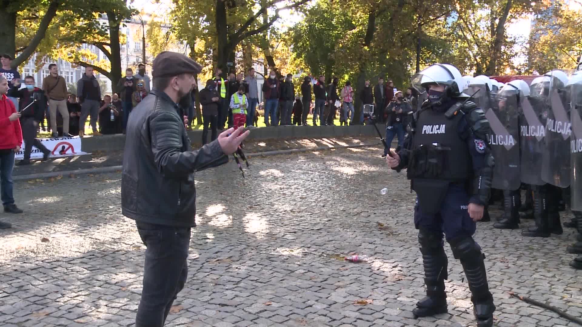 Riot police clash with anti-lockdown protesters in Warsaw