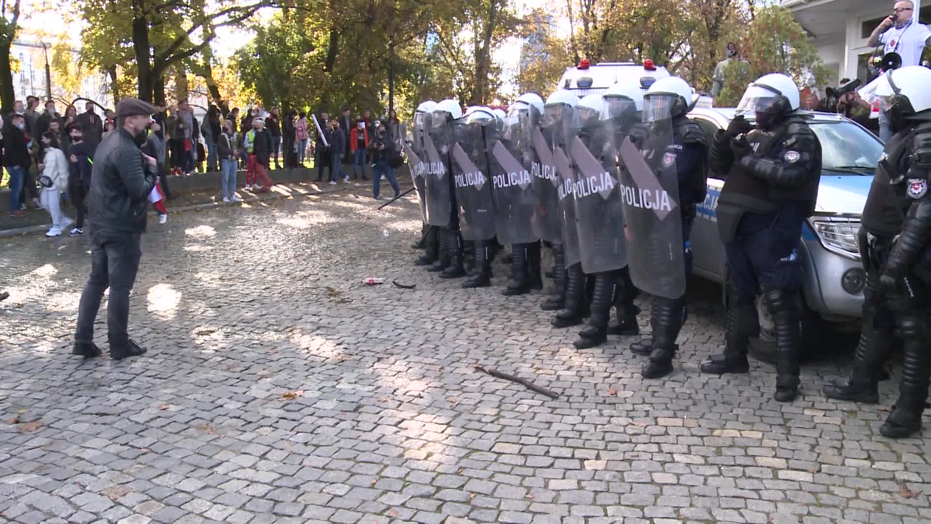 Riot police clash with anti-lockdown protesters in Warsaw