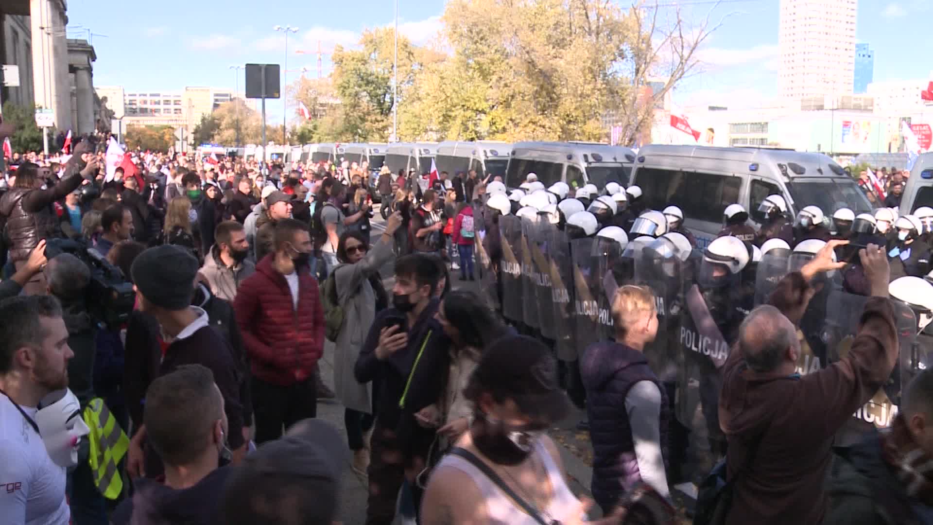 Riot police clash with anti-lockdown protesters in Warsaw