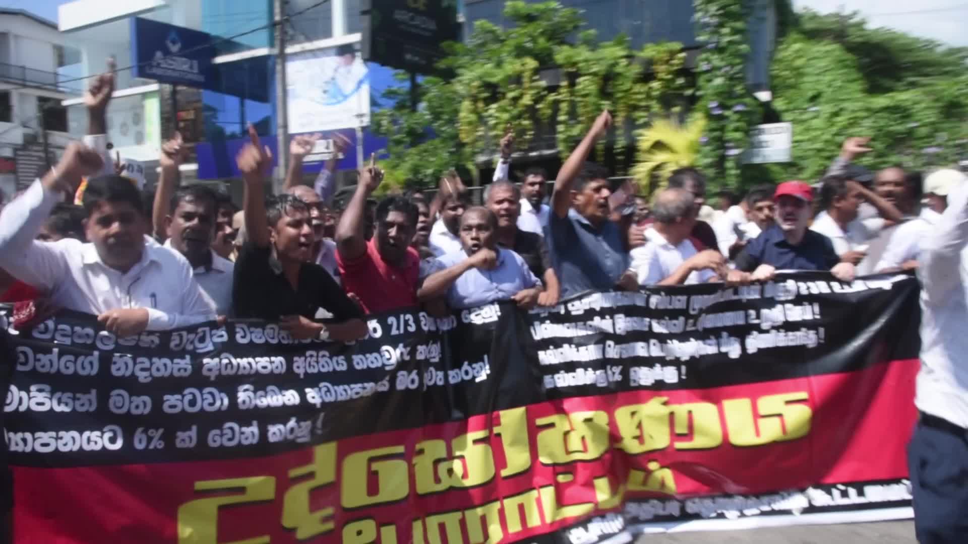Teaches union protest in Colombo