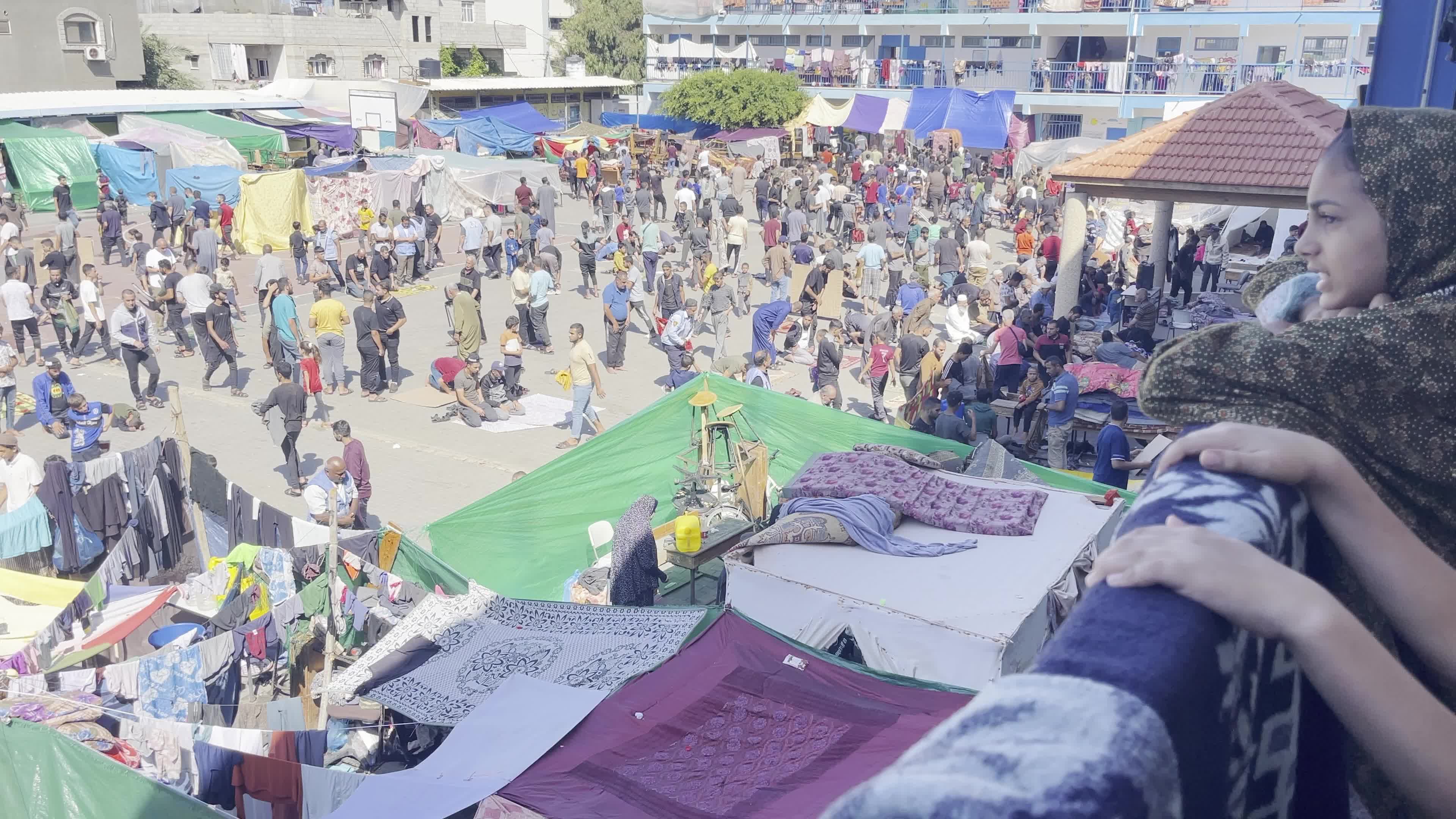 Displaced Palestinians Pray at UNRWA School in Khan Yunis Amid Conflict Between Hamas and Israel