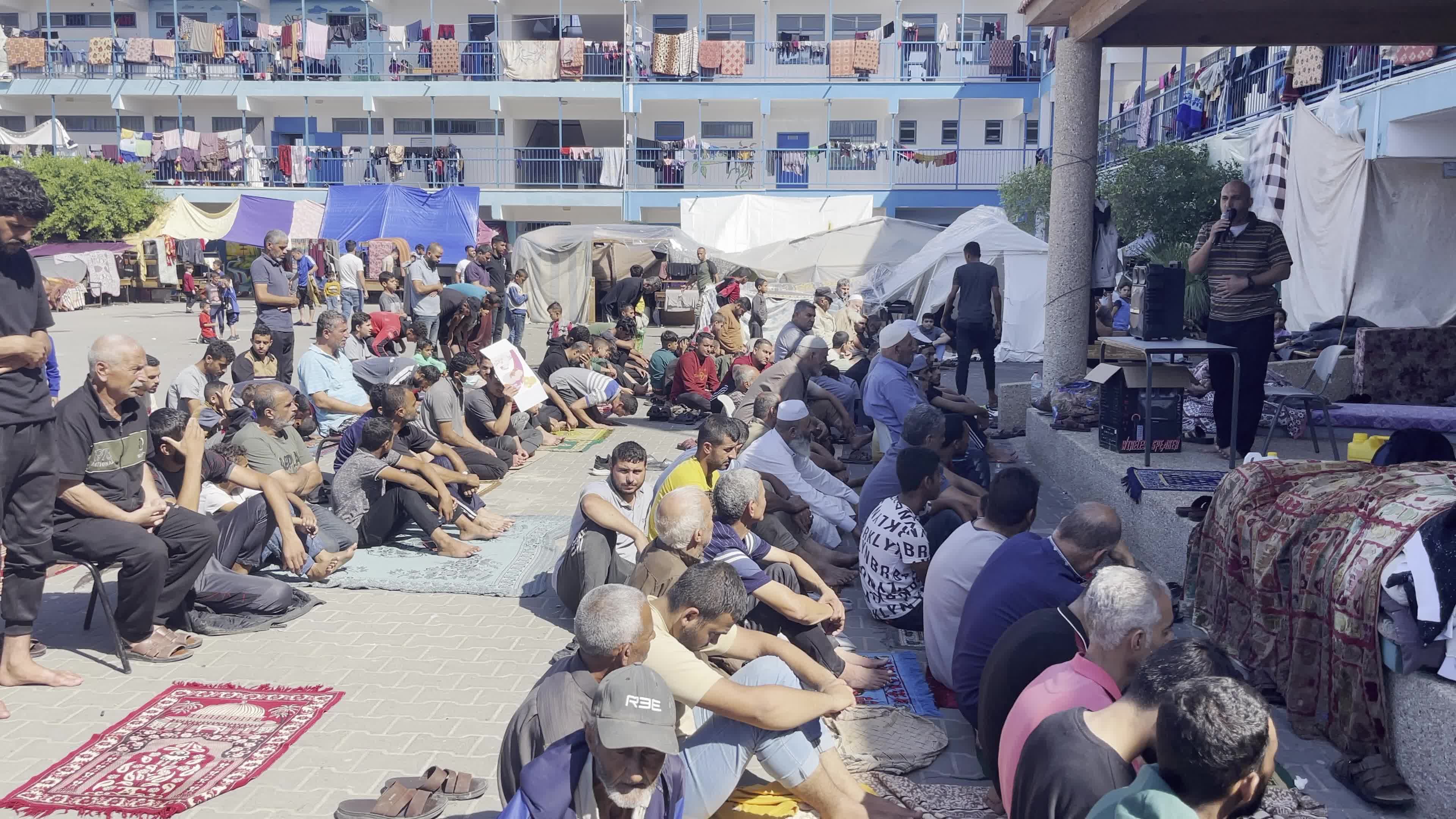 Displaced Palestinians Pray at UNRWA School in Khan Yunis Amid Conflict Between Hamas and Israel