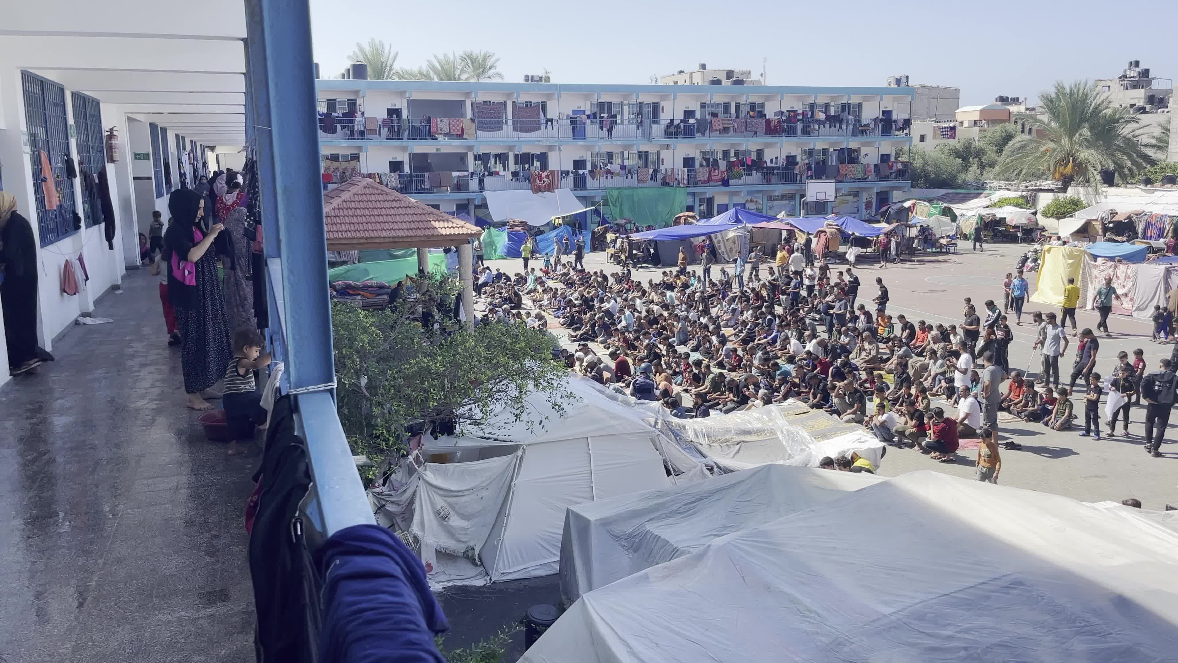 Displaced Palestinians Pray at UNRWA School in Khan Yunis Amid Conflict Between Hamas and Israel