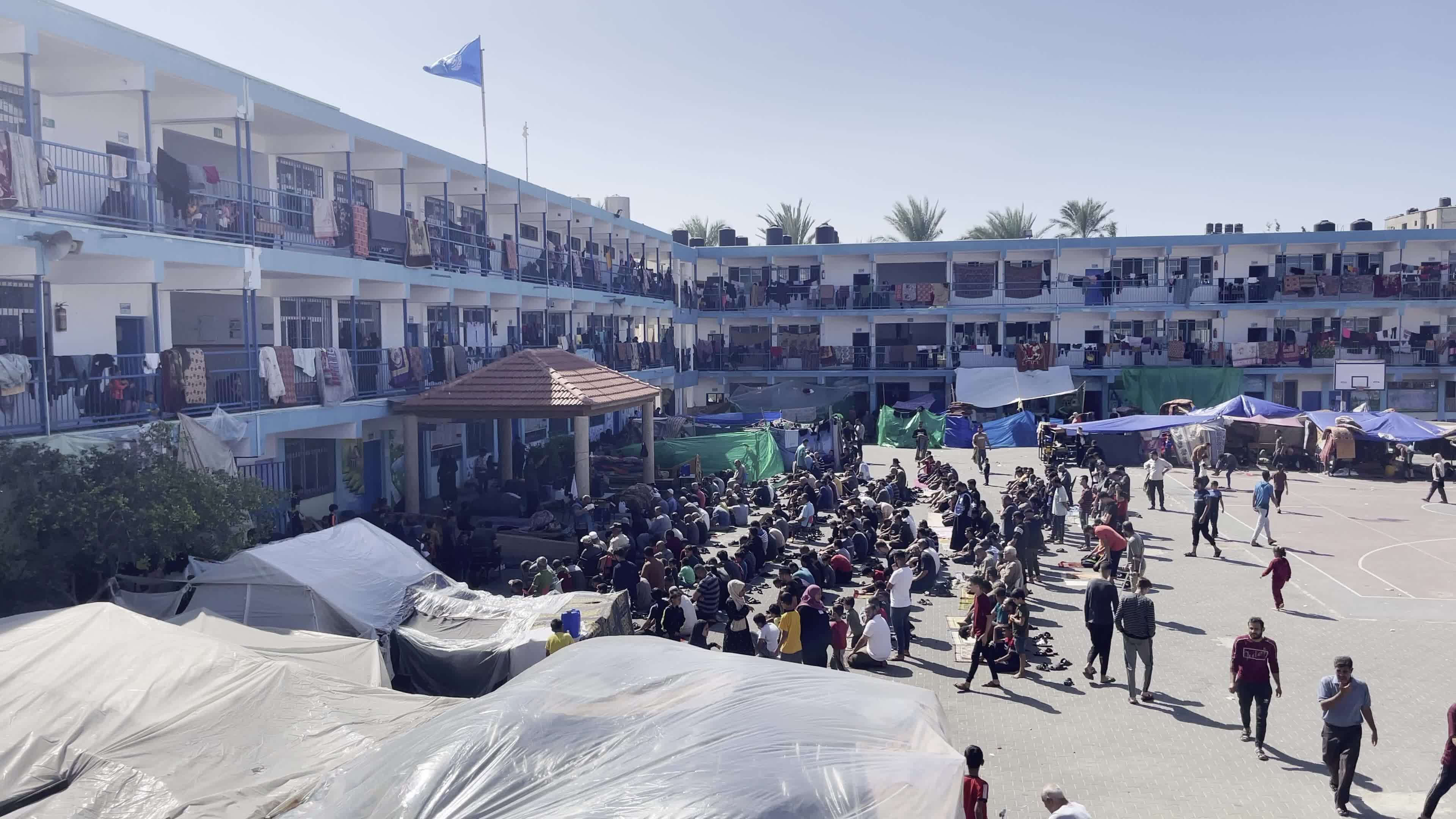 Displaced Palestinians Pray at UNRWA School in Khan Yunis Amid Conflict Between Hamas and Israel