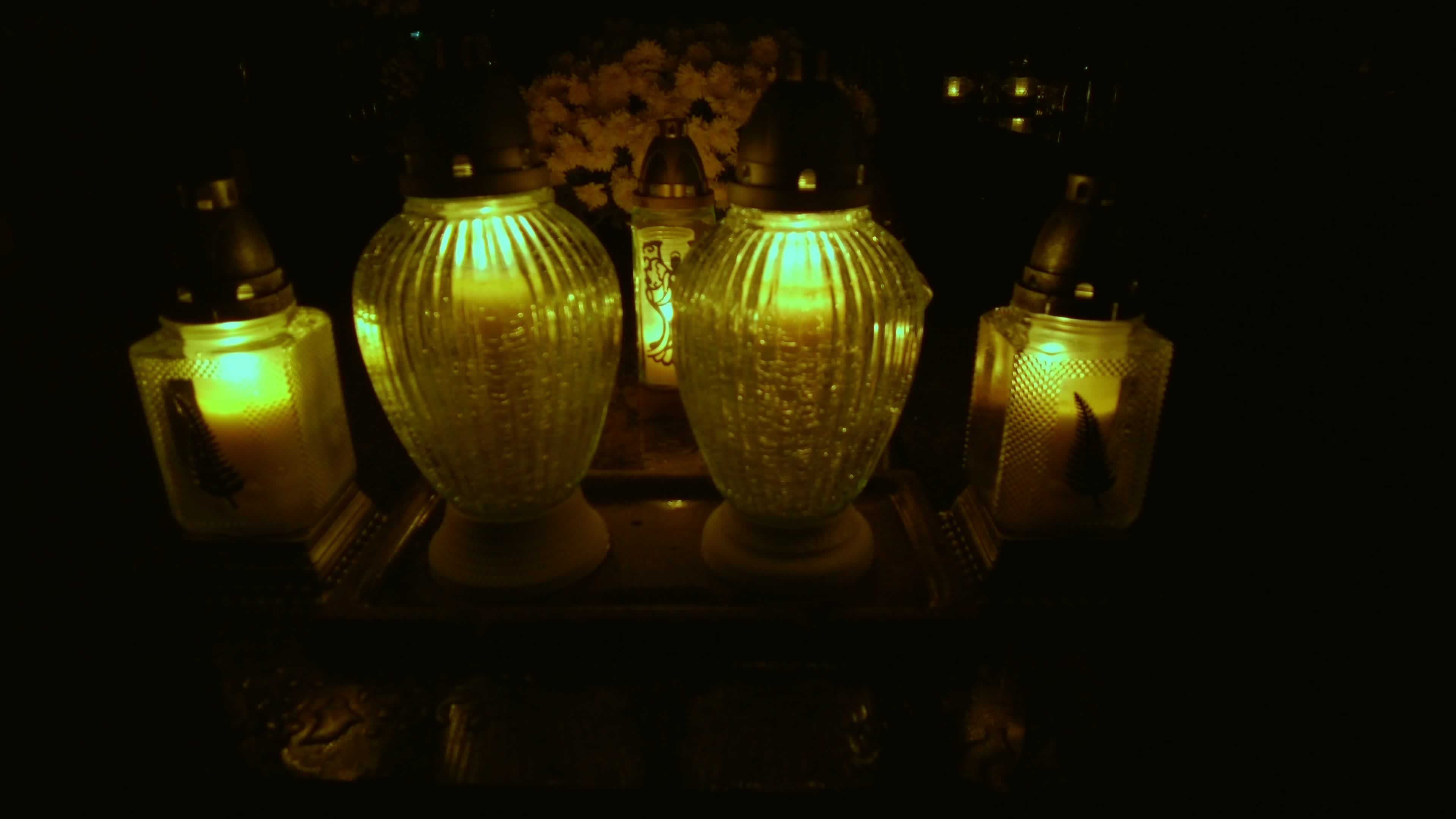 All Saints Day cemetery at night 