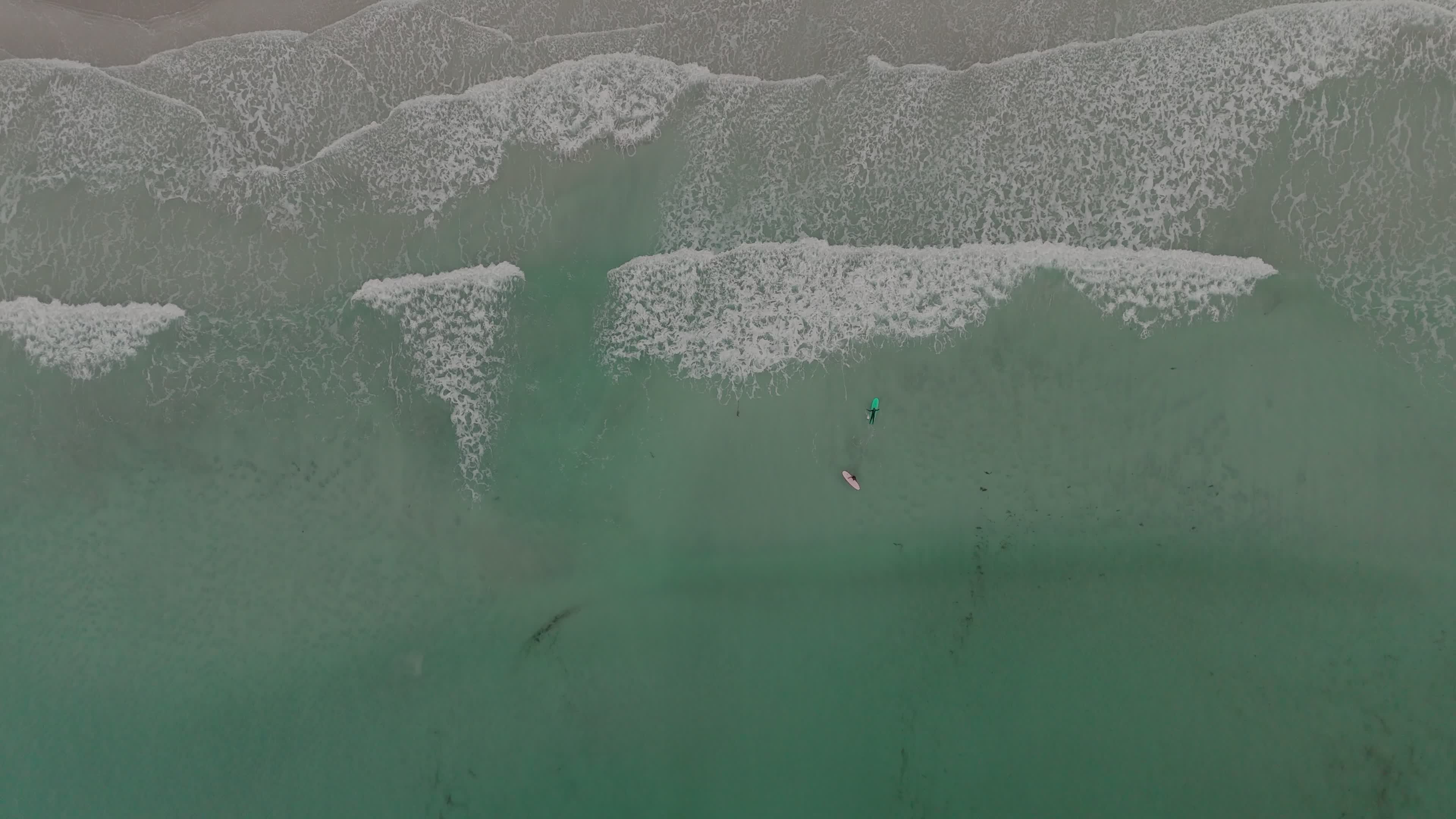 Drone View Of People Practicing Surfing In The Lofoten Islands