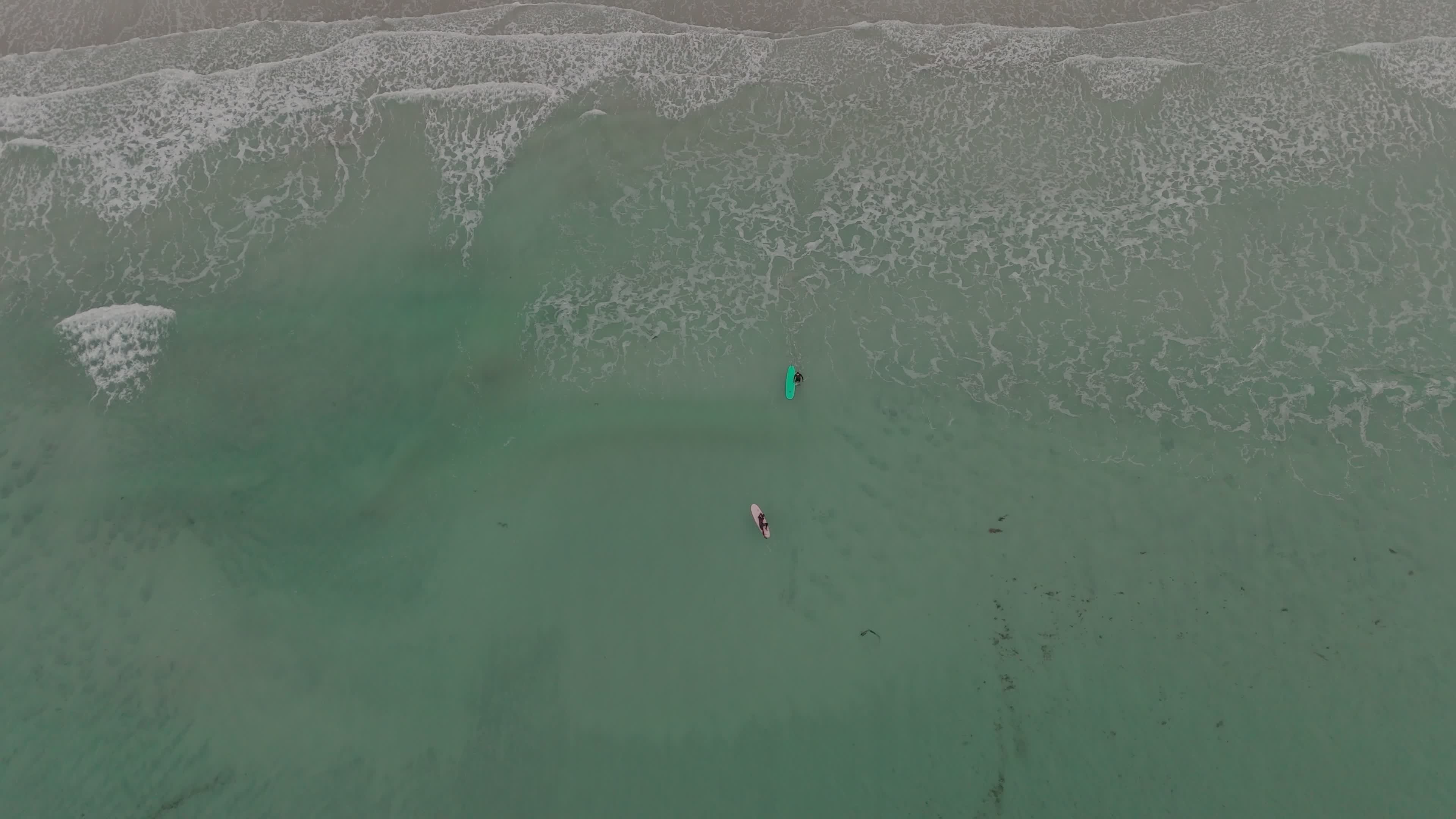 Drone View Of People Practicing Surfing In The Lofoten Islands