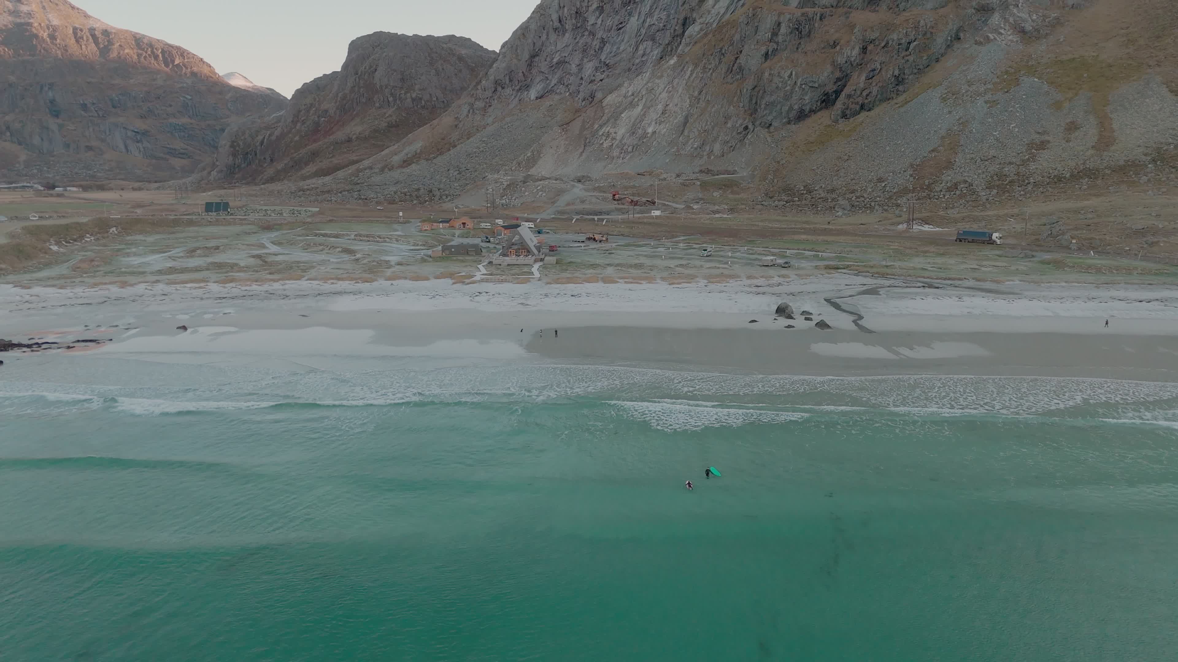 Drone View Of People Practicing Surfing In The Lofoten Islands